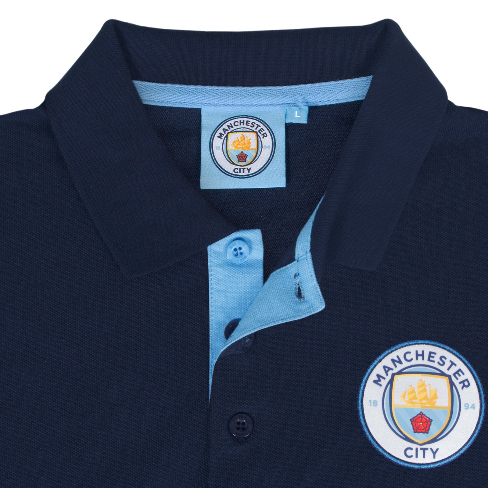 Man City adults polo shirt in navy blue with contrast sleeve and club crest to the chest.