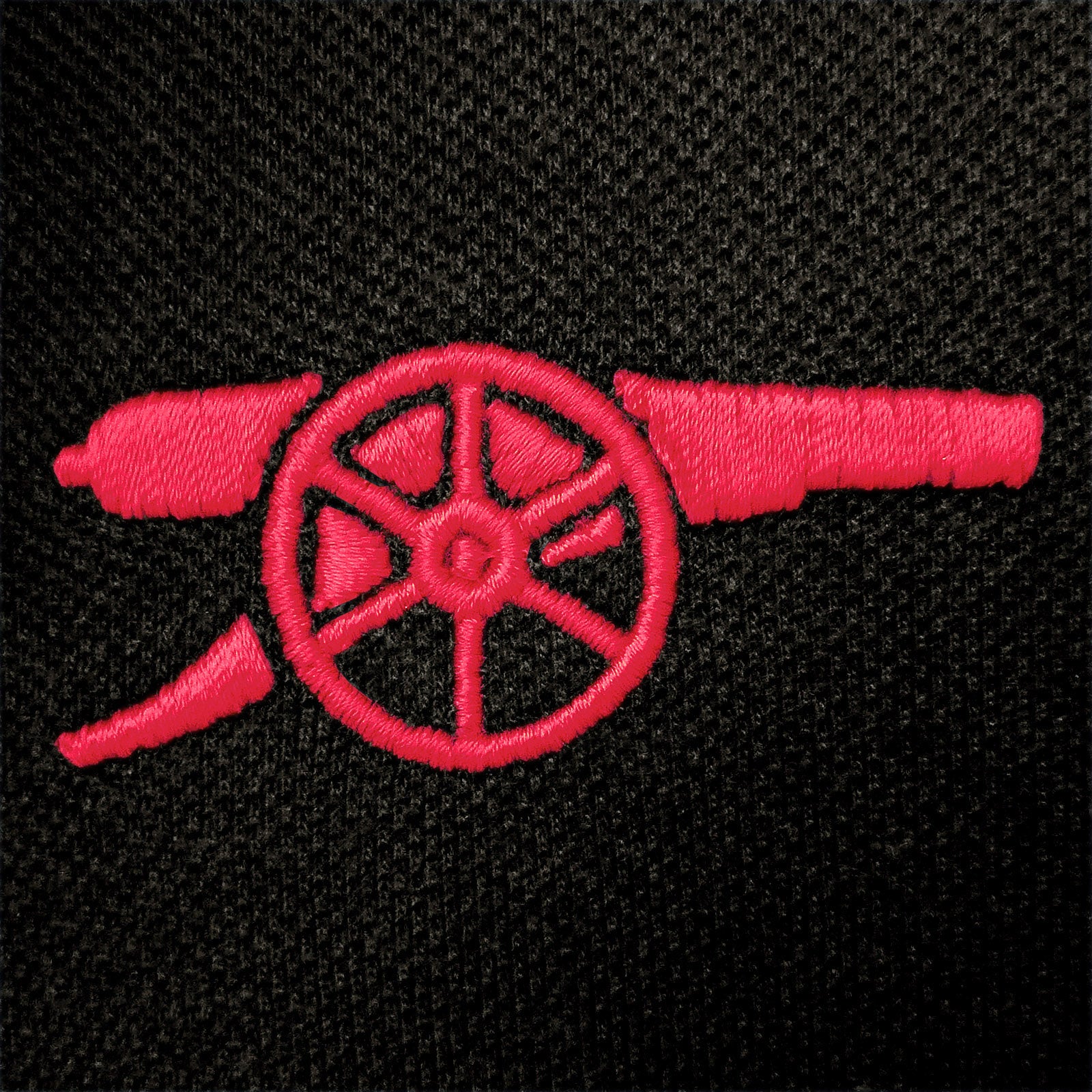 Arsenal polo shirt for adults in black with club crest and canon to chest.