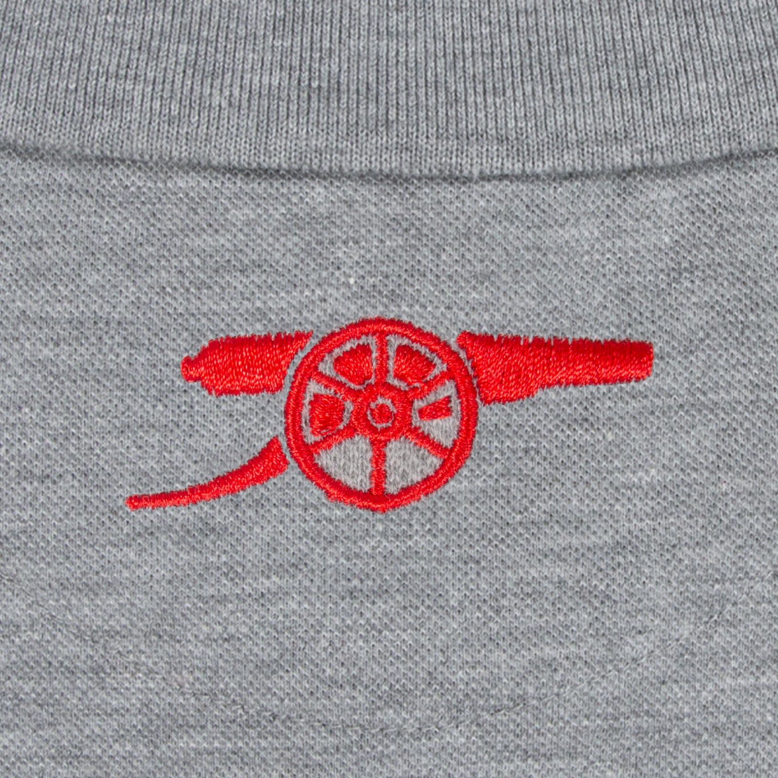 Arsenal polo shirt for adults in grey featuring the club crest and Champions 2026 graphic to the chest