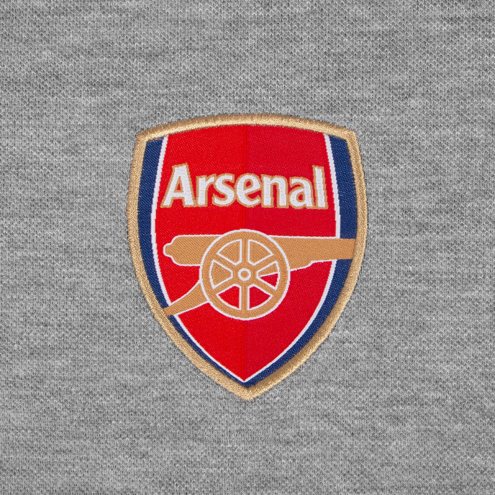 Arsenal polo shirt for adults in grey featuring the club crest and Champions 2026 graphic to the chest