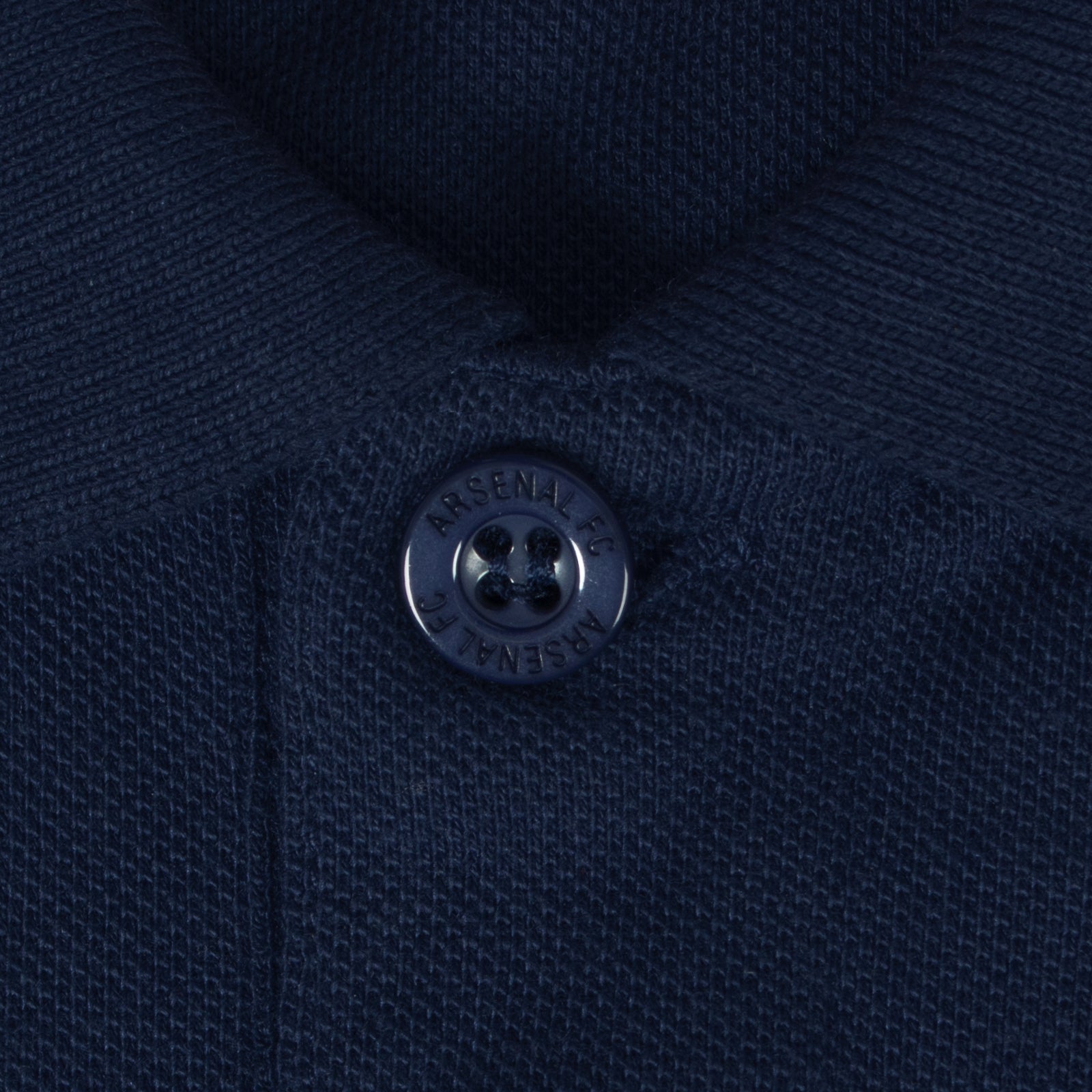 Arsenal polo shirt for adults in navy blue with club crest and canon to chest.