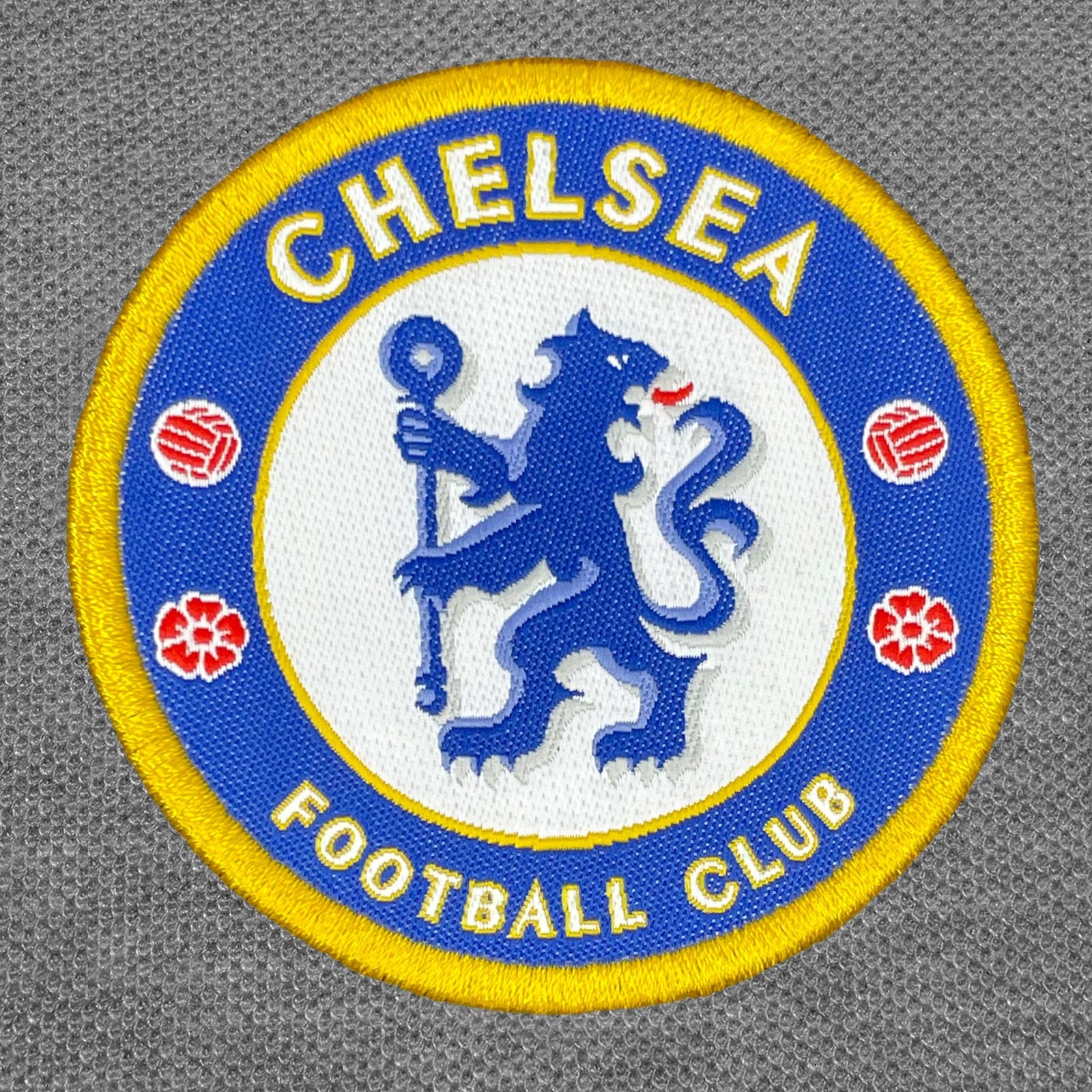 Chelsea adults polo shirt in grey with crest and Chelsea FC text to chest