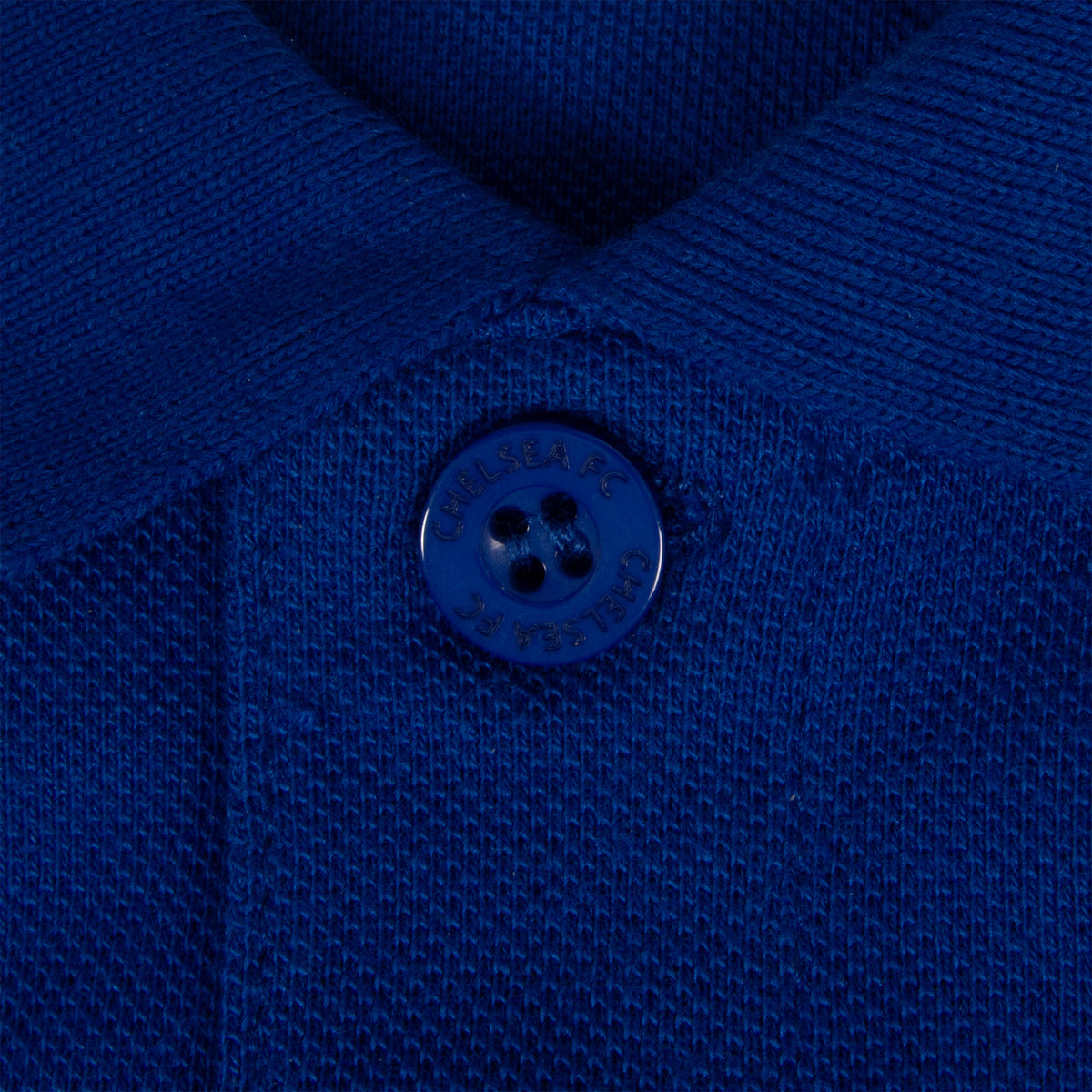 Chelsea adults polo shirt in royal blue with crest and Chelsea FC text to chest