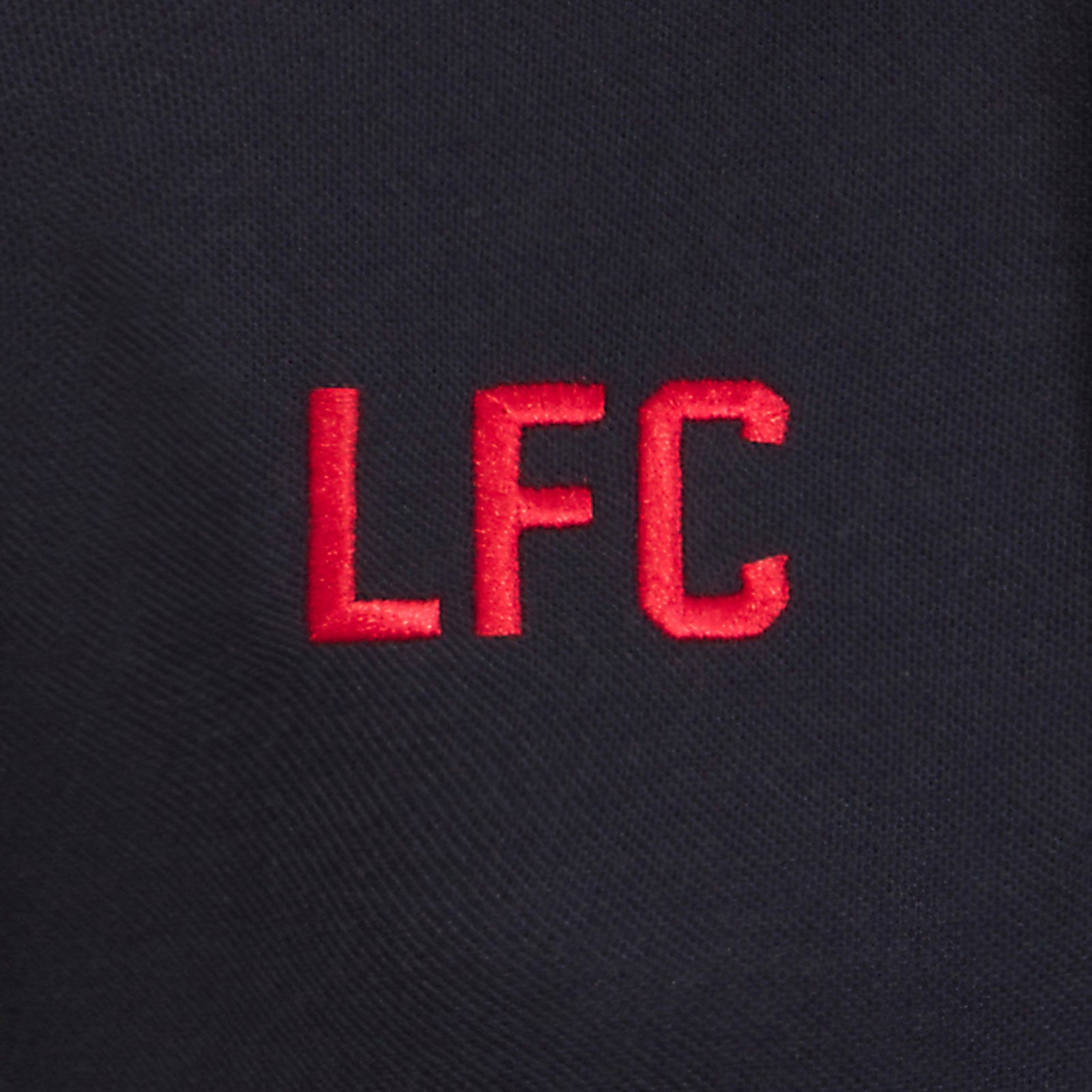 Liverpool adults polo shirt in black & contrast sleeve with LFC badge and Liverpool FC text to chest.