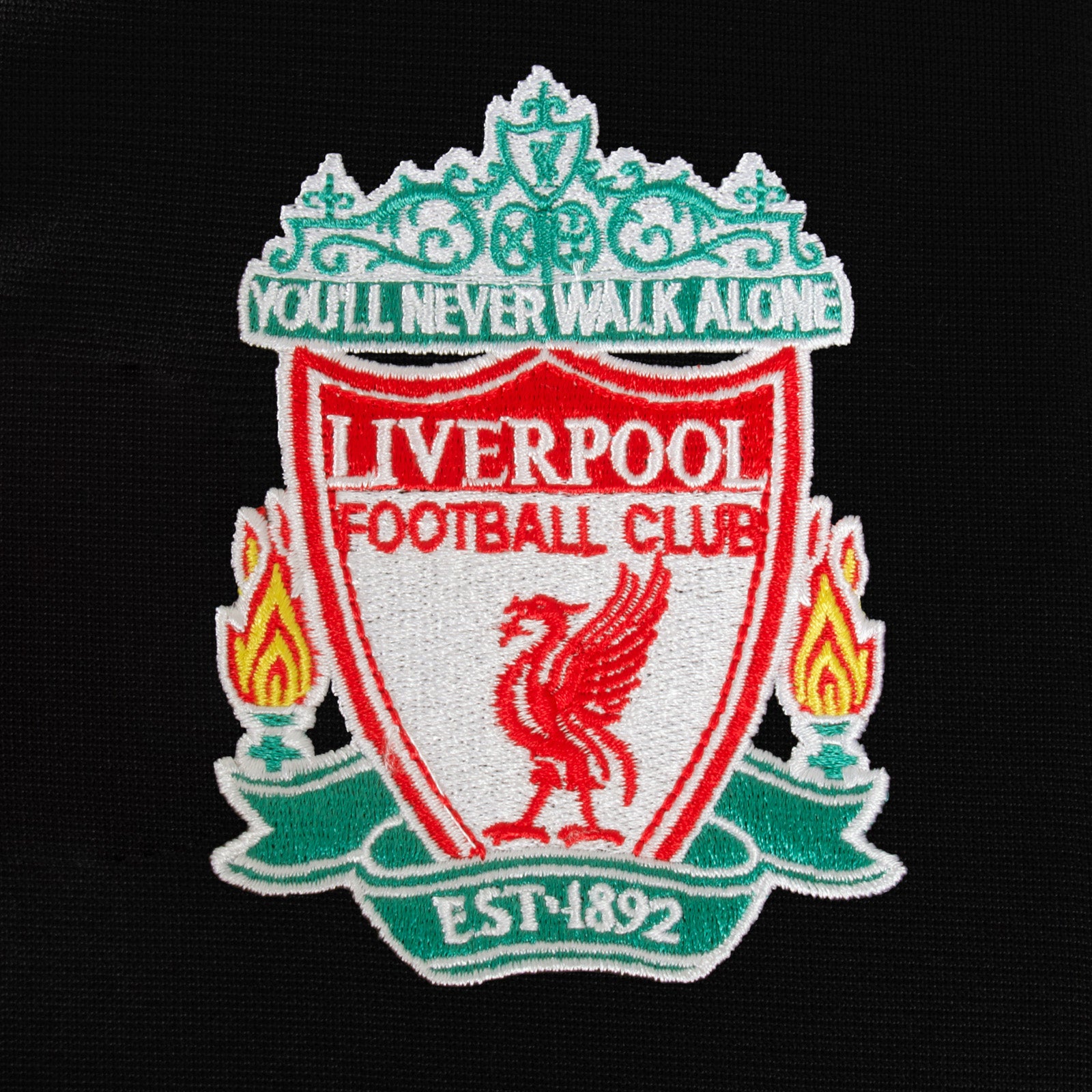 Liverpool adults retro track jacket in black with woven club crest to chest.
