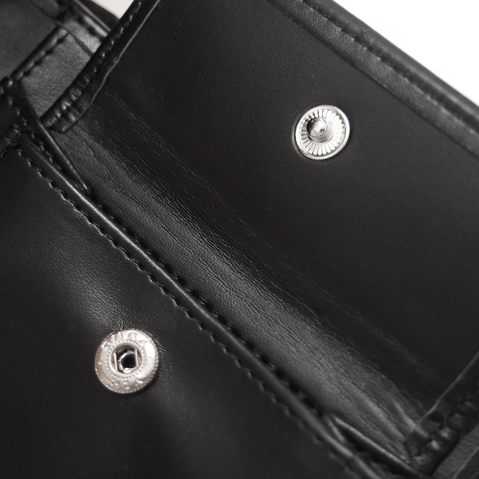 Celtic faux leather wallet in black with embossed club crest