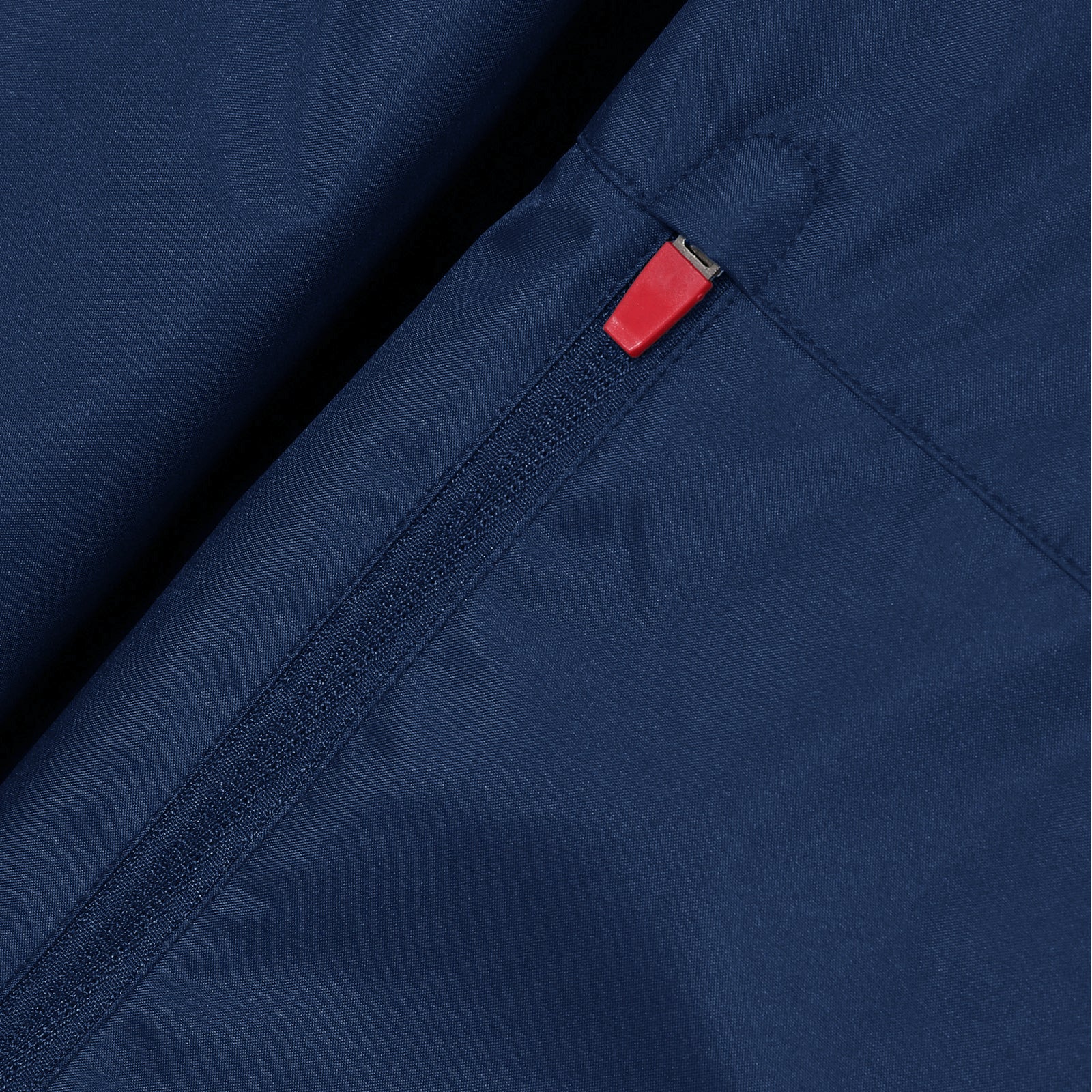 Liverpool adults shower jacket with hood in navy with club crest to chest.