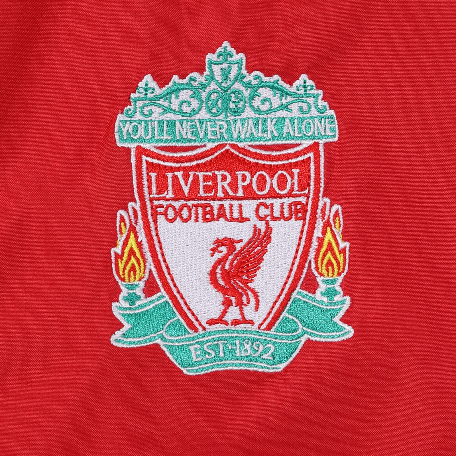 Liverpool kids shower Jacket in black & red with club crest to chest.
