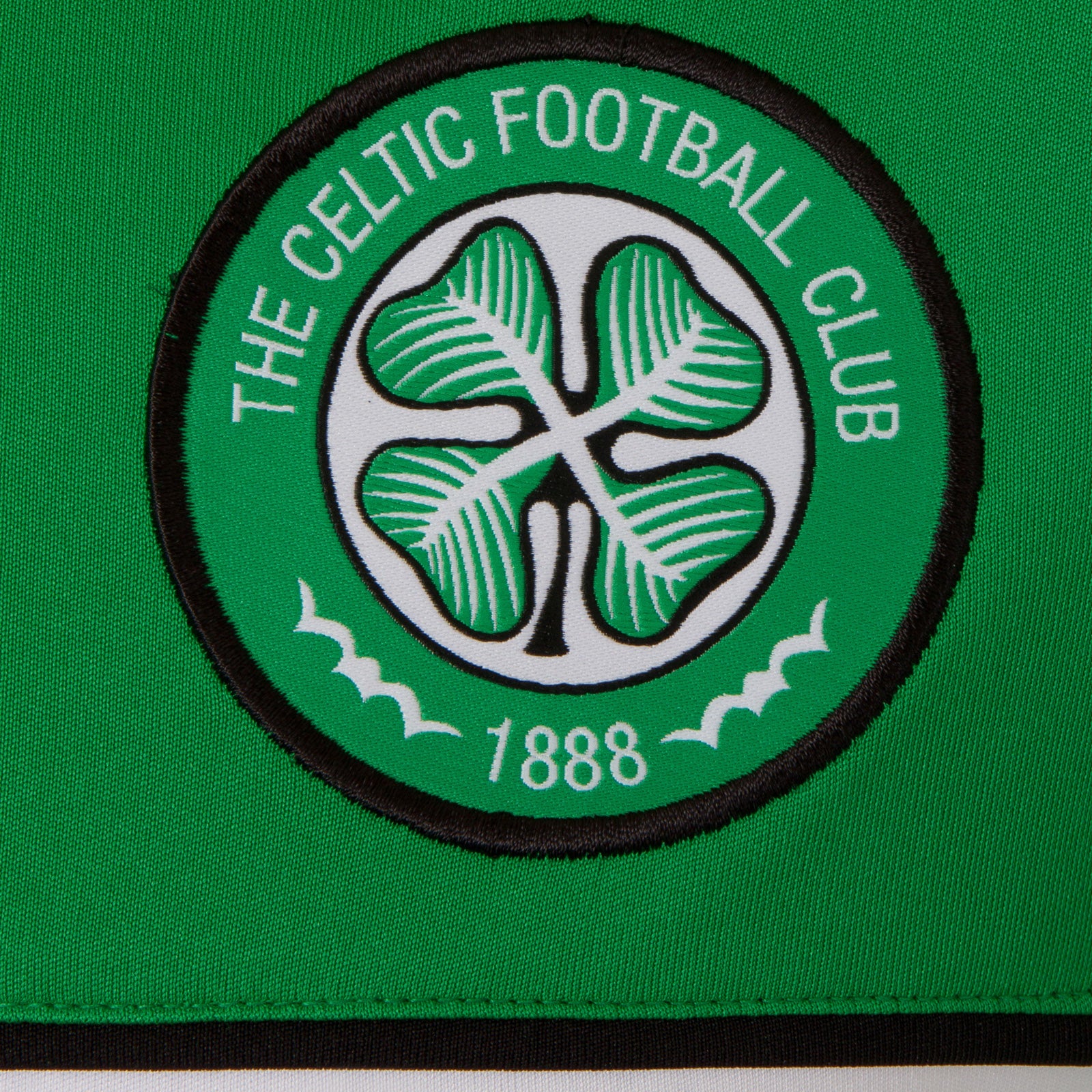 Celtic adults T-shirt in green & white stripe with club crest to chest