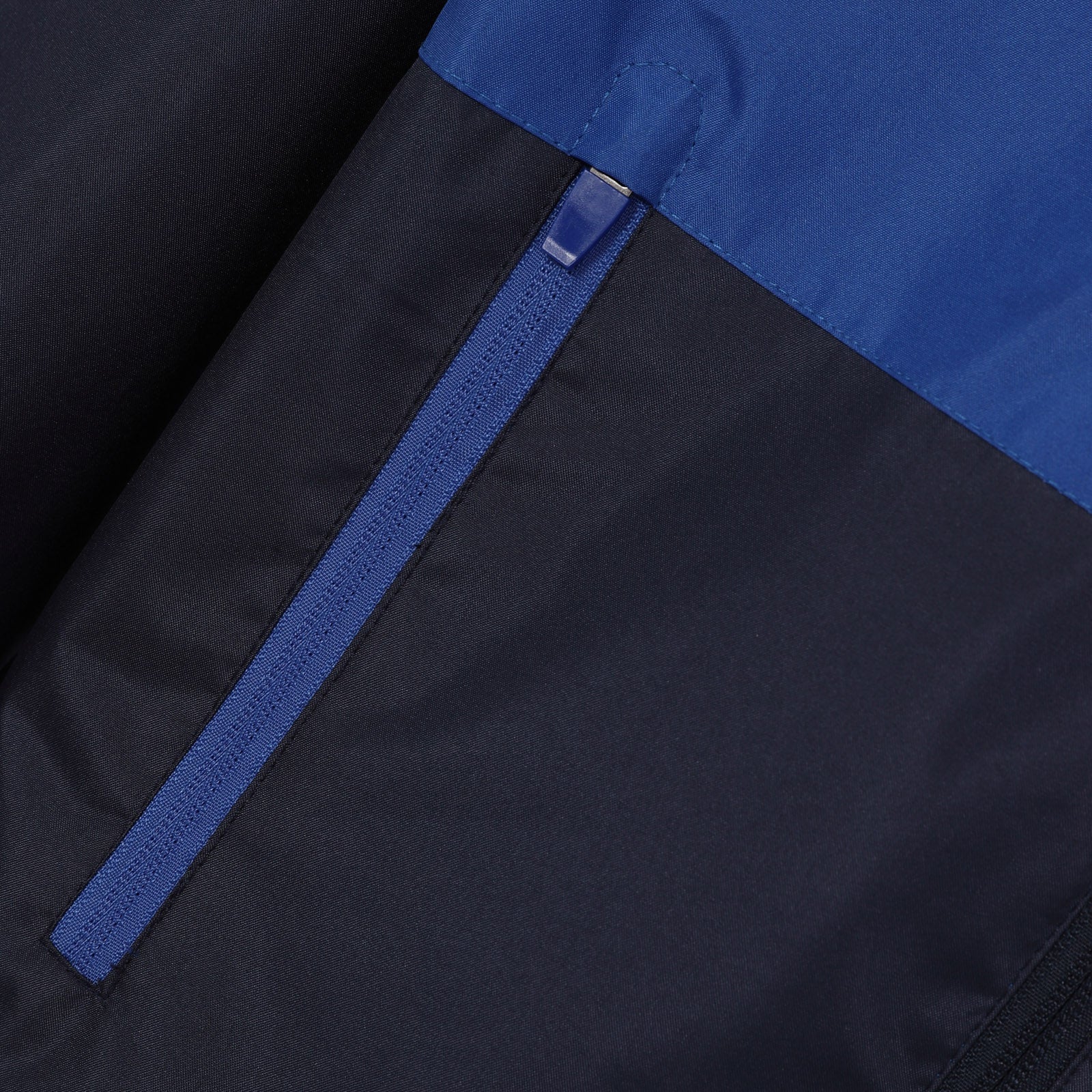 Chelsea kids shower jacket in navy blue with club crest to chest.