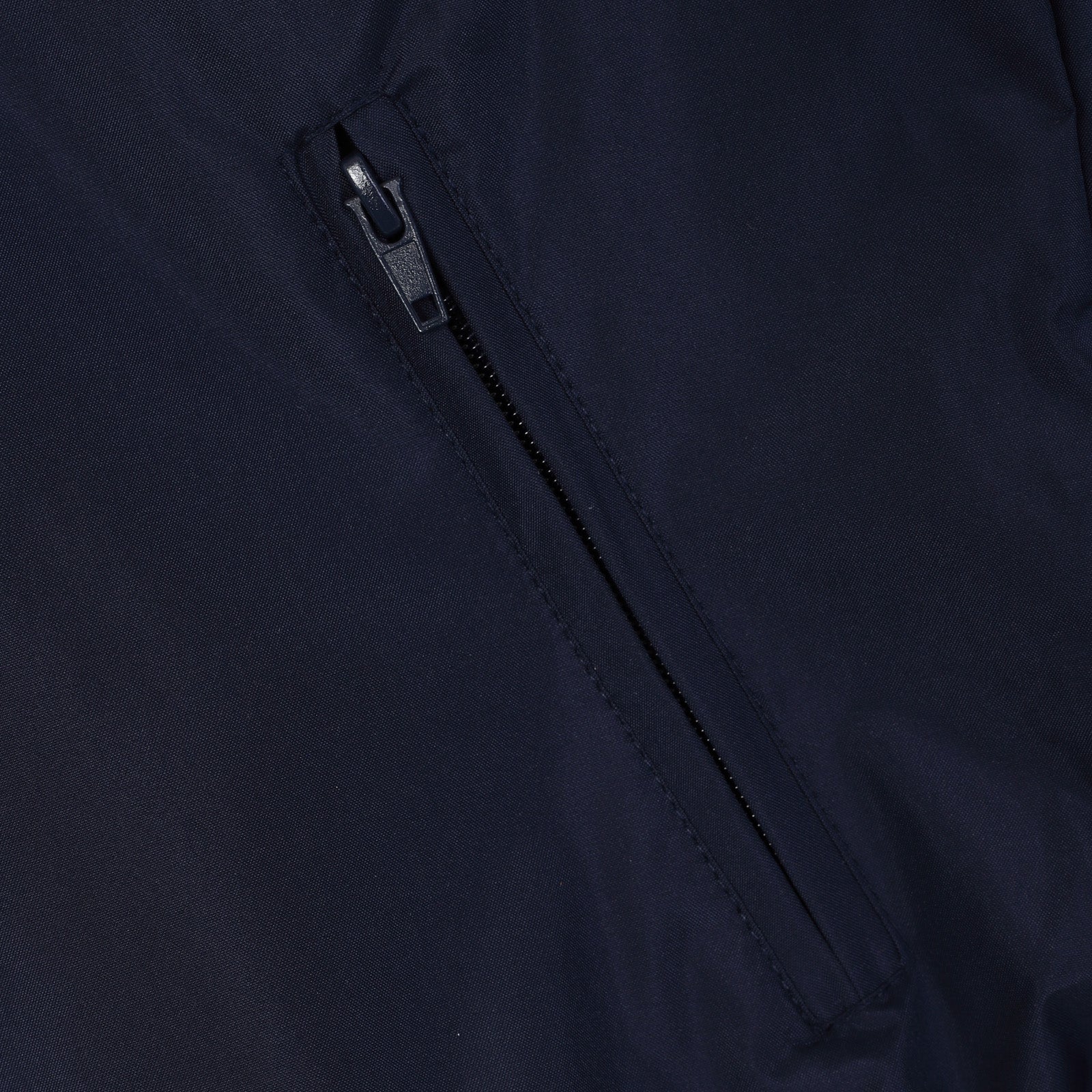 FC Barcelona kids shower jacket in navy blue with a FCB club crest to chest.