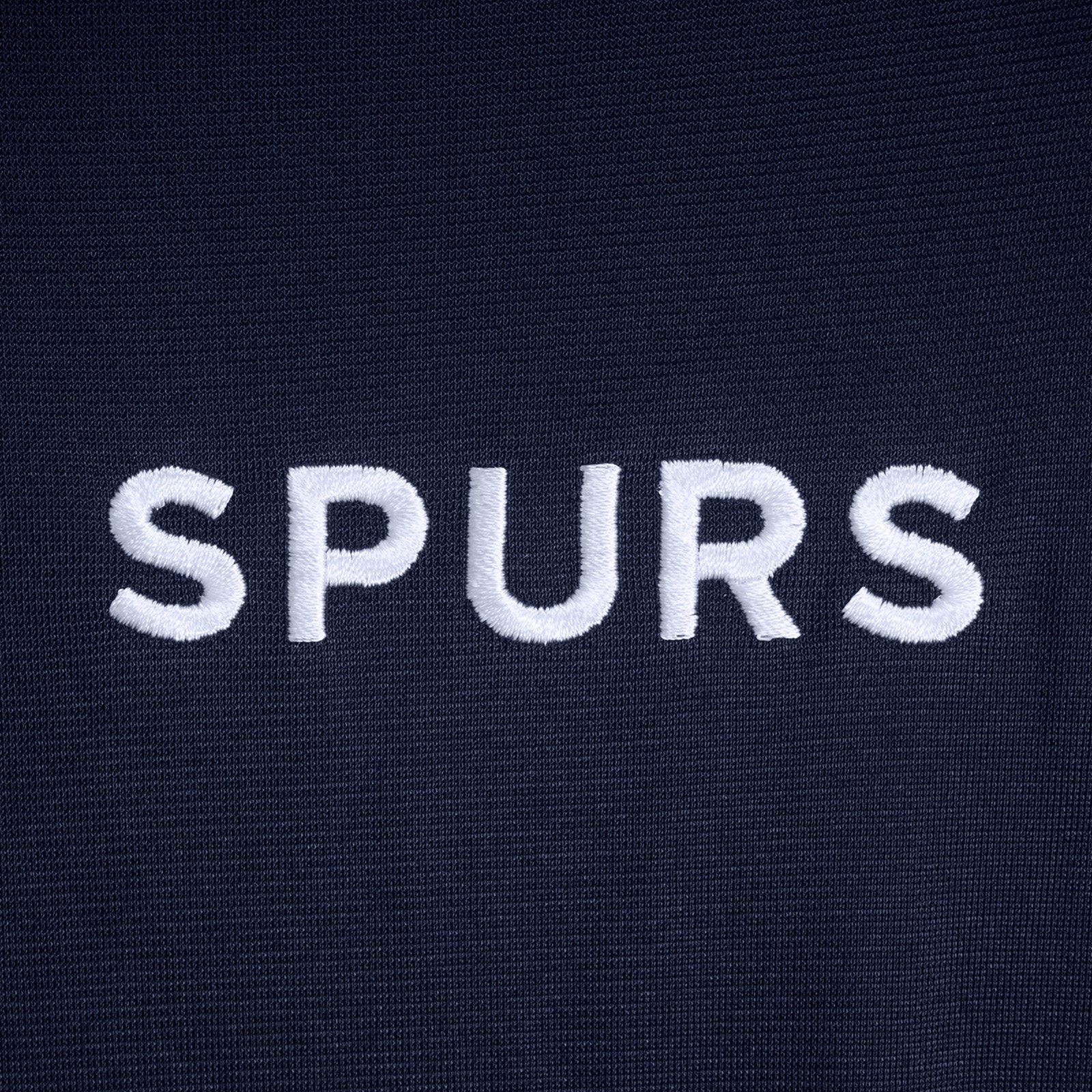 Spurs adults retro track jacket in navy blue with club crest to chest.