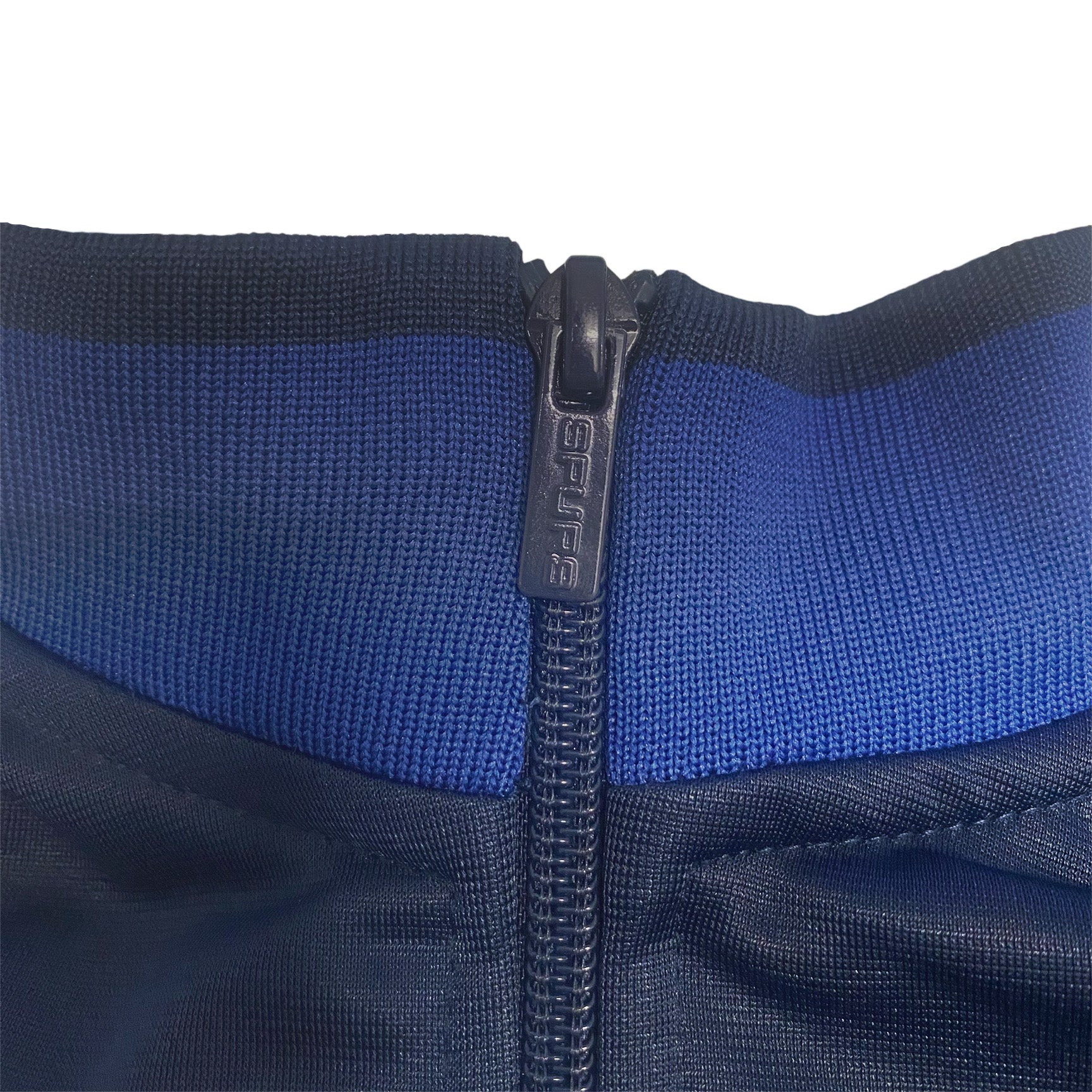Spurs kids retro track jacket in navy blue with club crest to chest.