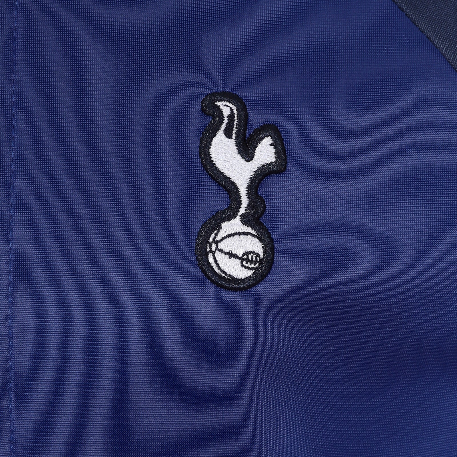 Spurs kids retro track jacket in navy & royal blue with club crest to chest.