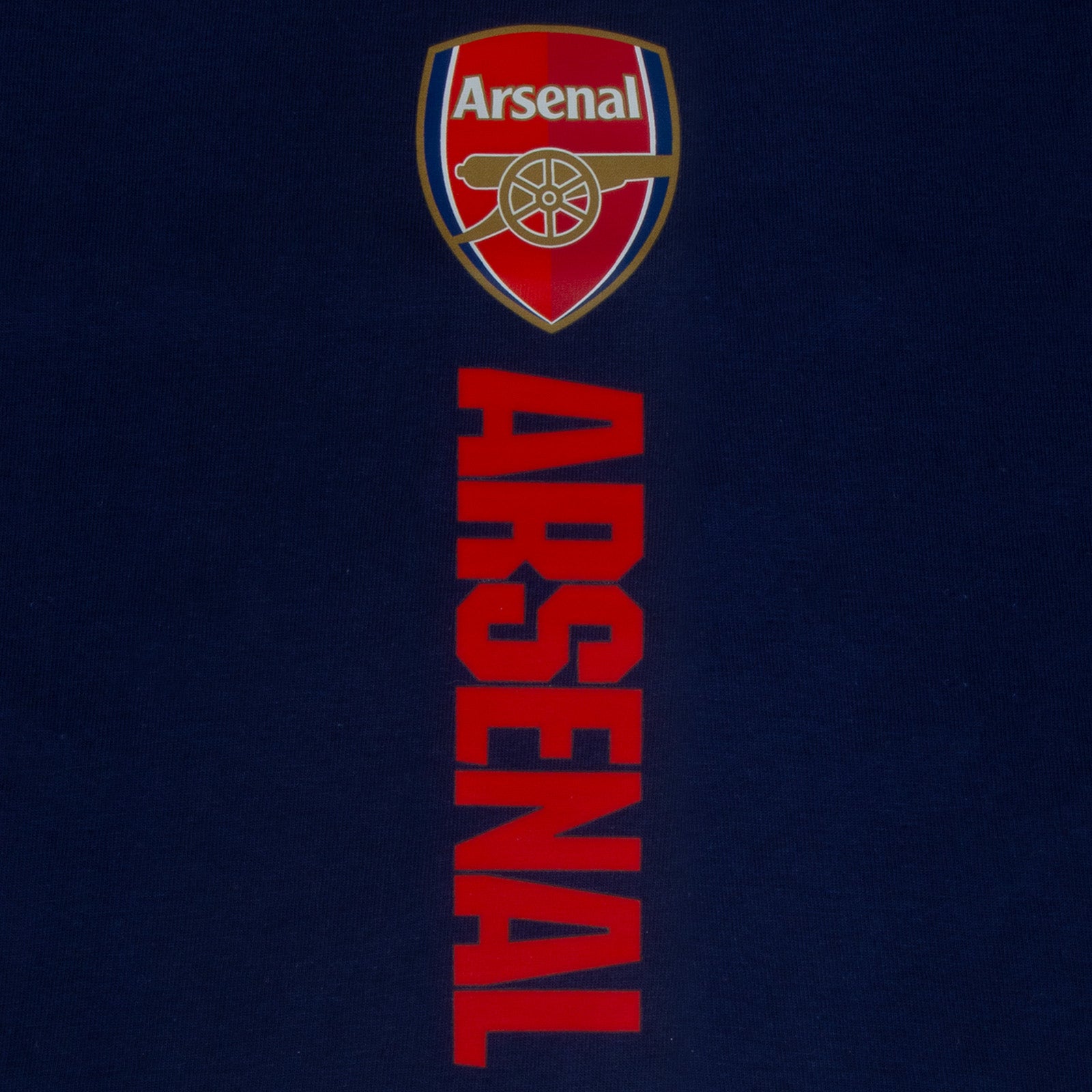 Arsenal kids pyjamas. Short sleeve top in navy blue with large graphic Arsenal club crest and pyjama shorts in navy with club crest and text to the left leg