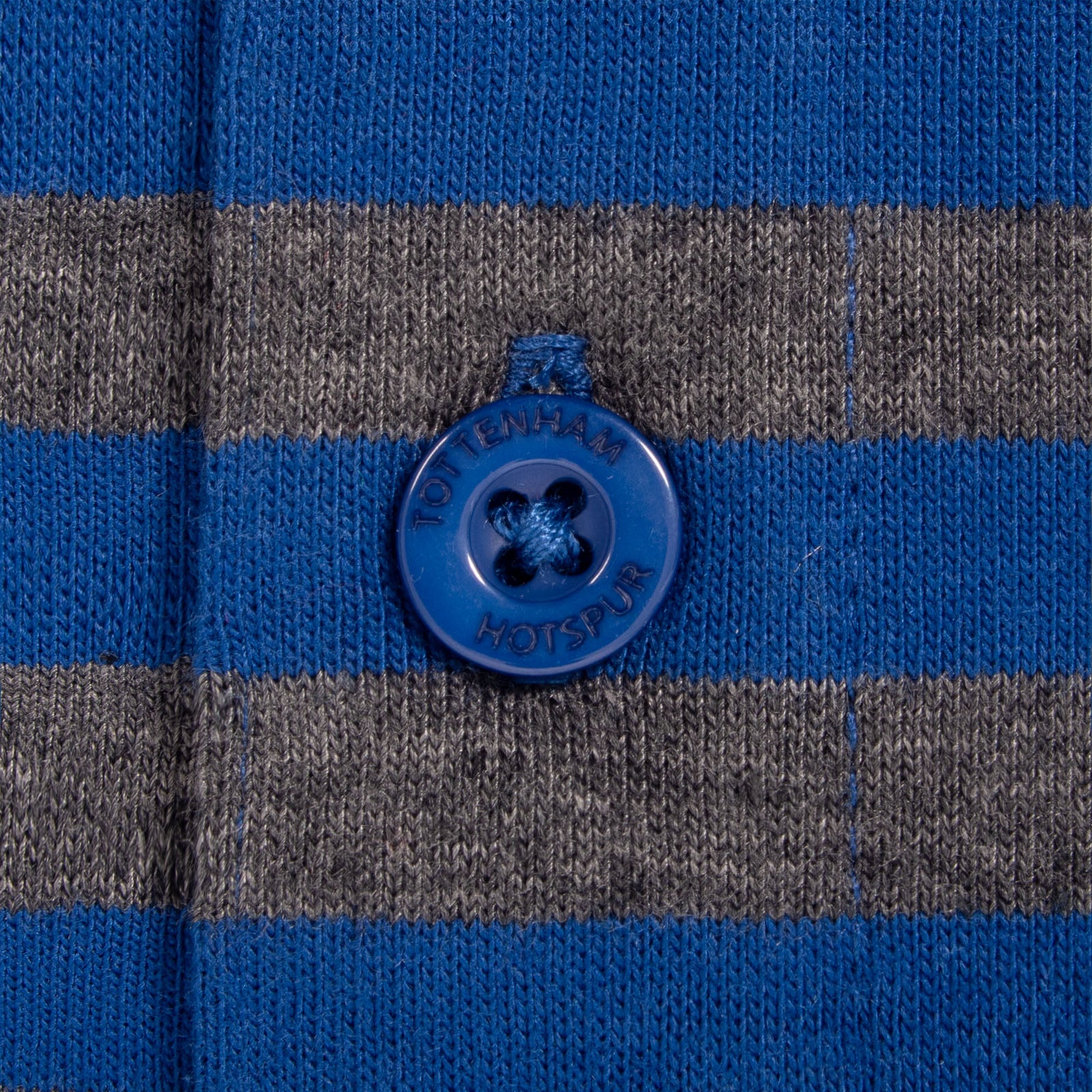 Spurs adults striped polo shirt in blue & grey with club crest to chest.