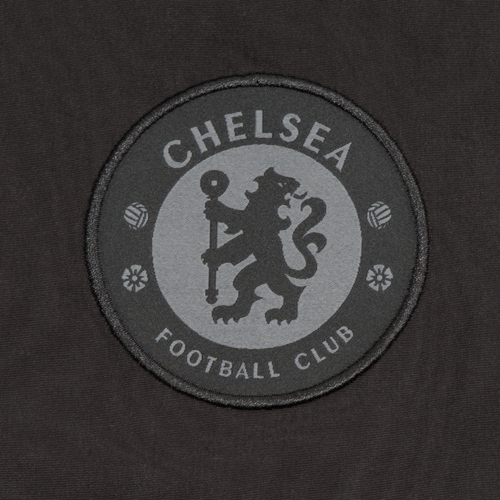Chelsea adults tracksuit in grey with club crest to chest and left thigh