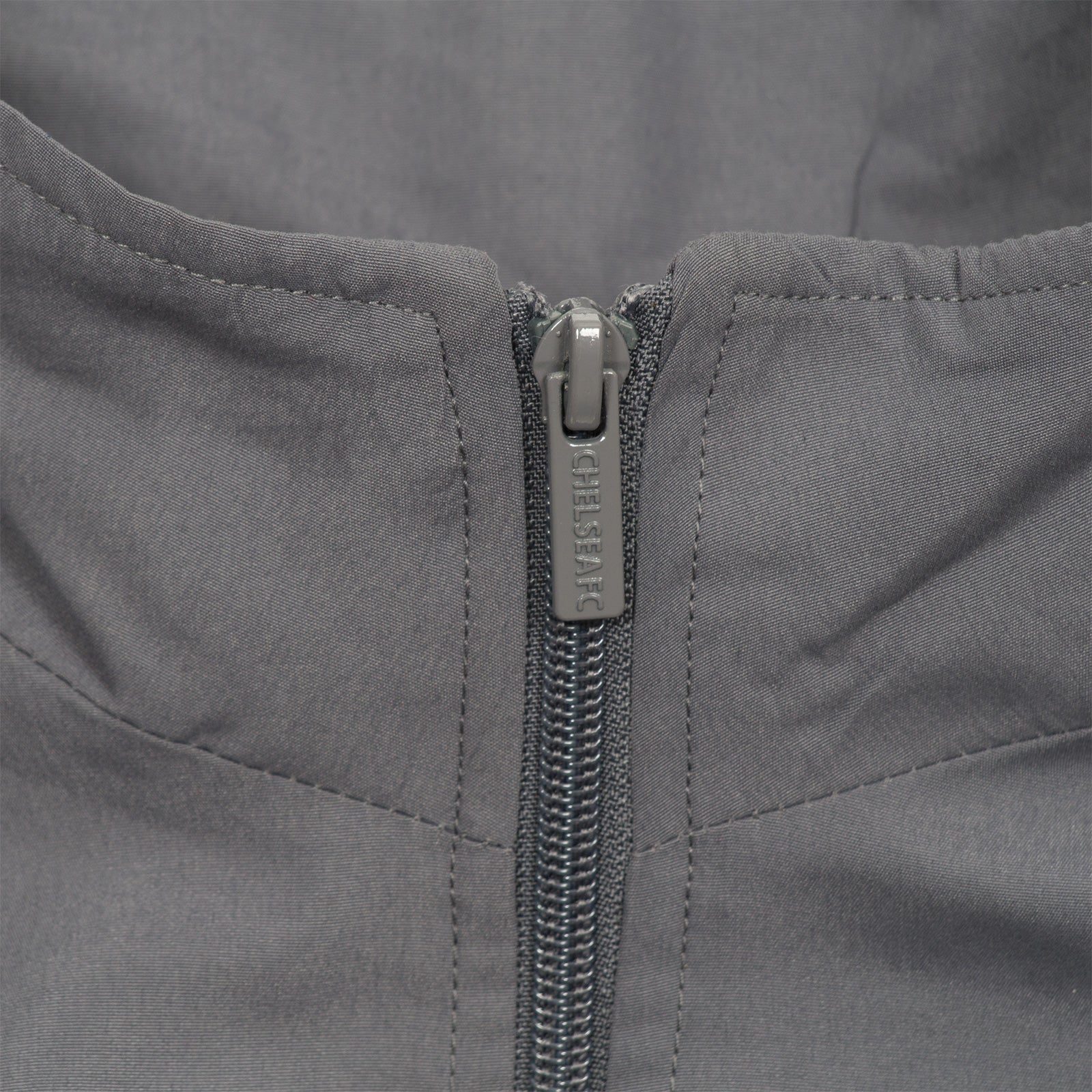 Chelsea kids tracksuit in grey with club crest to chest and left thigh