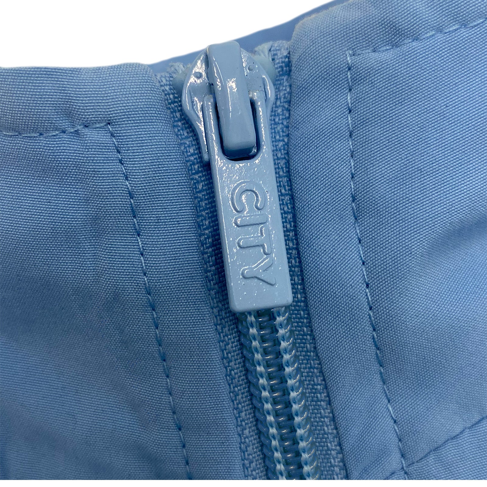 Man City kids tracksuit in navy blue with club crest to chest and left thigh