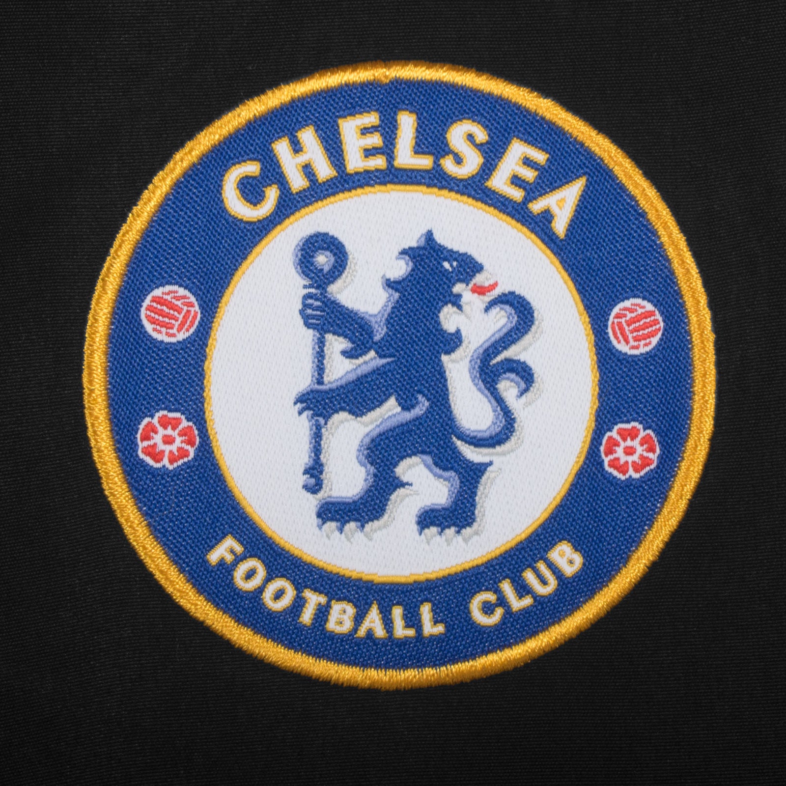 Chelsea kids tracksuit in grey with club crest to chest and left thigh