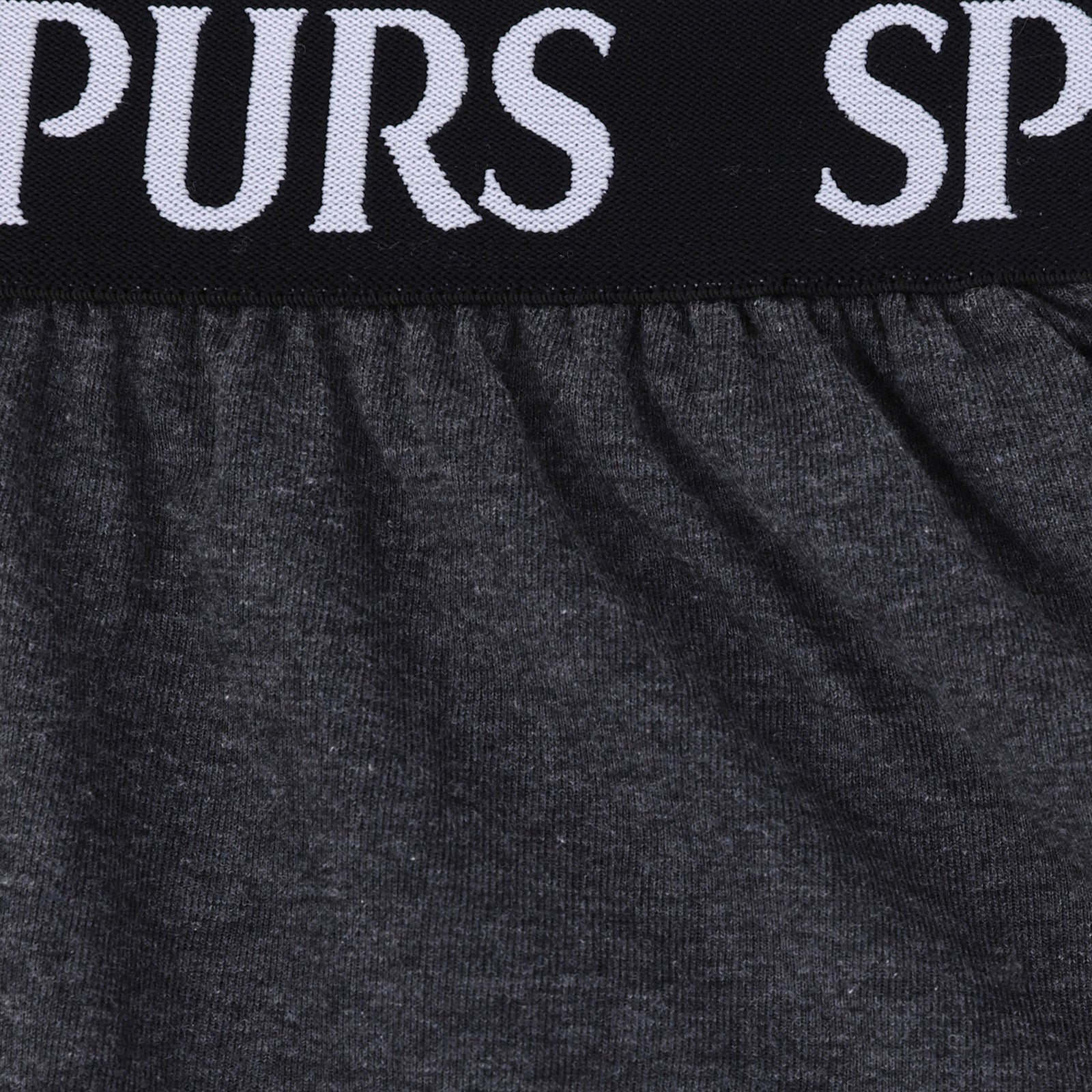 Spurs adults short pyjama set in grey with a short sleeve t-shirt & graphic and shorts with logo to the left leg.