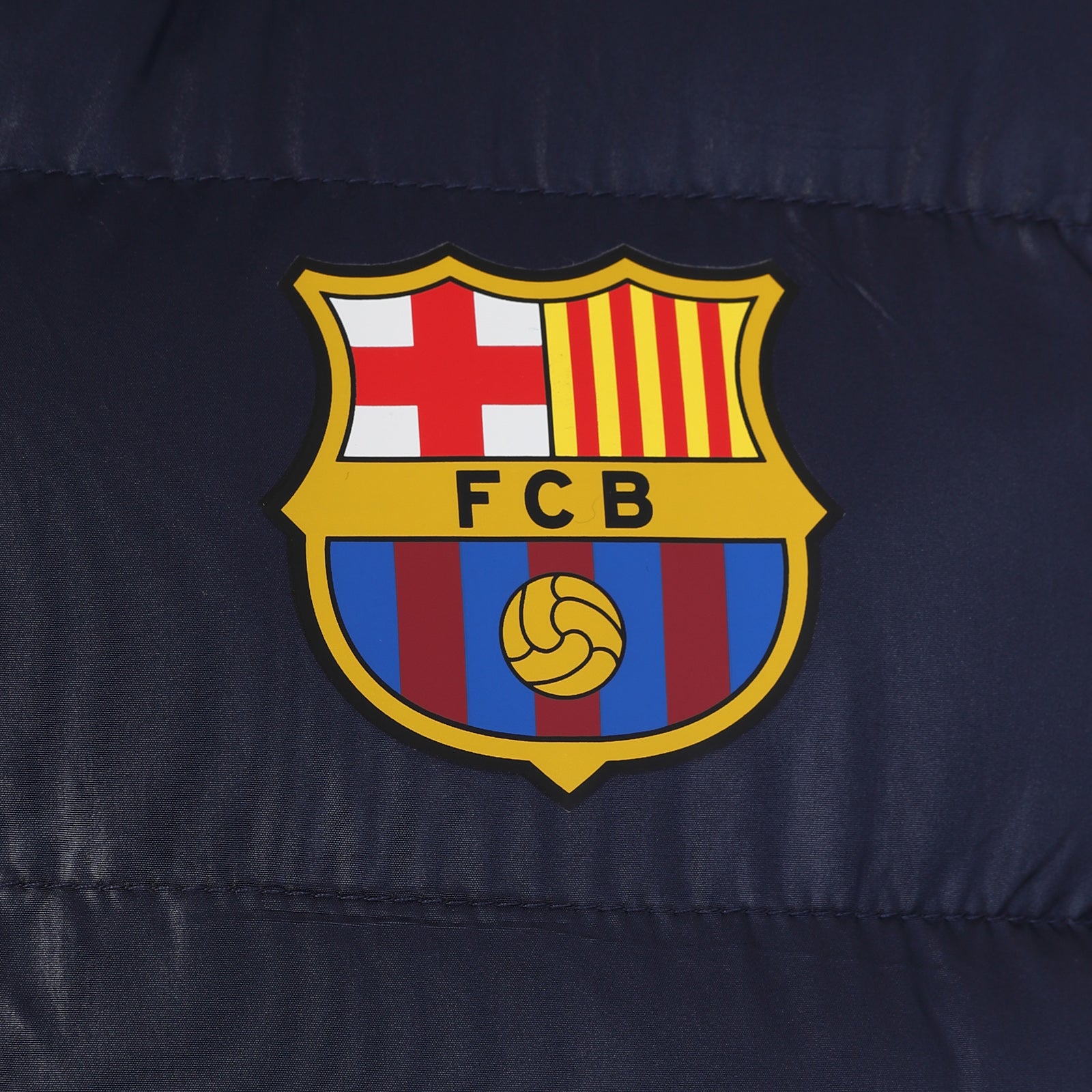 FC Barcelona kids gilet in navy blue with FCB club crest to the left chest.