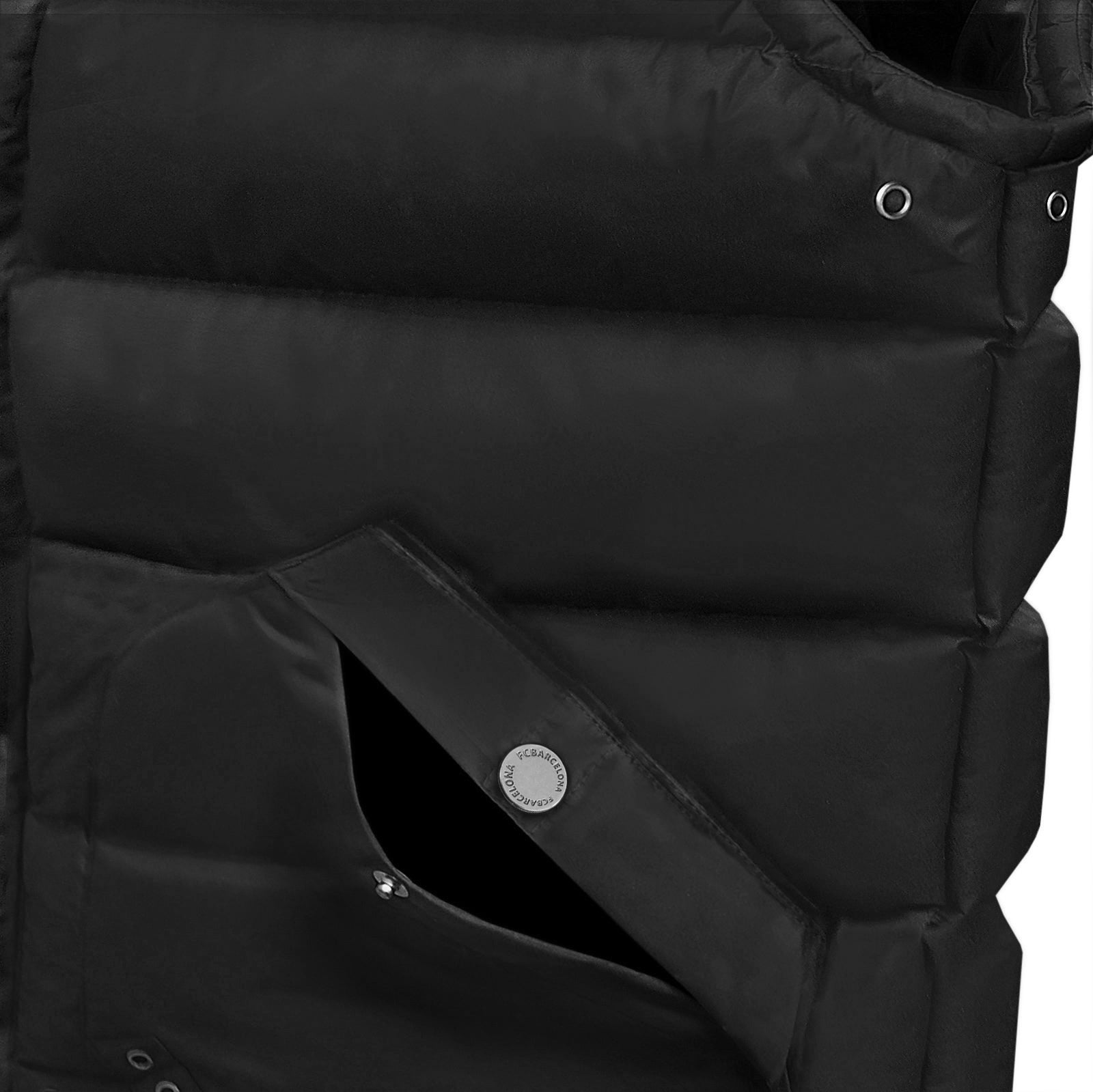 FC Barcelona kids gilet in black with FCB club crest to the left chest.