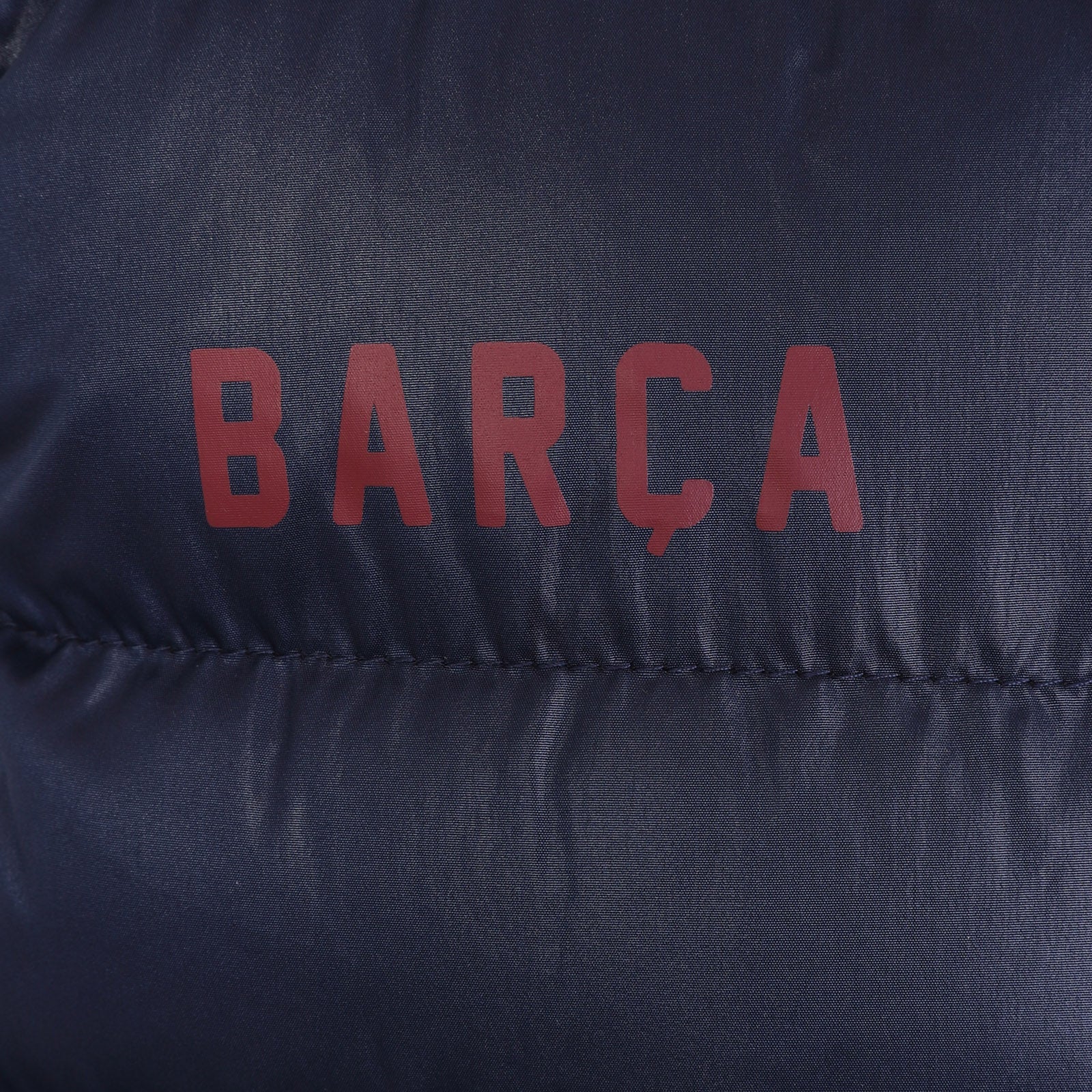 FC Barcelona kids gilet in black with FCB club crest to the left chest.