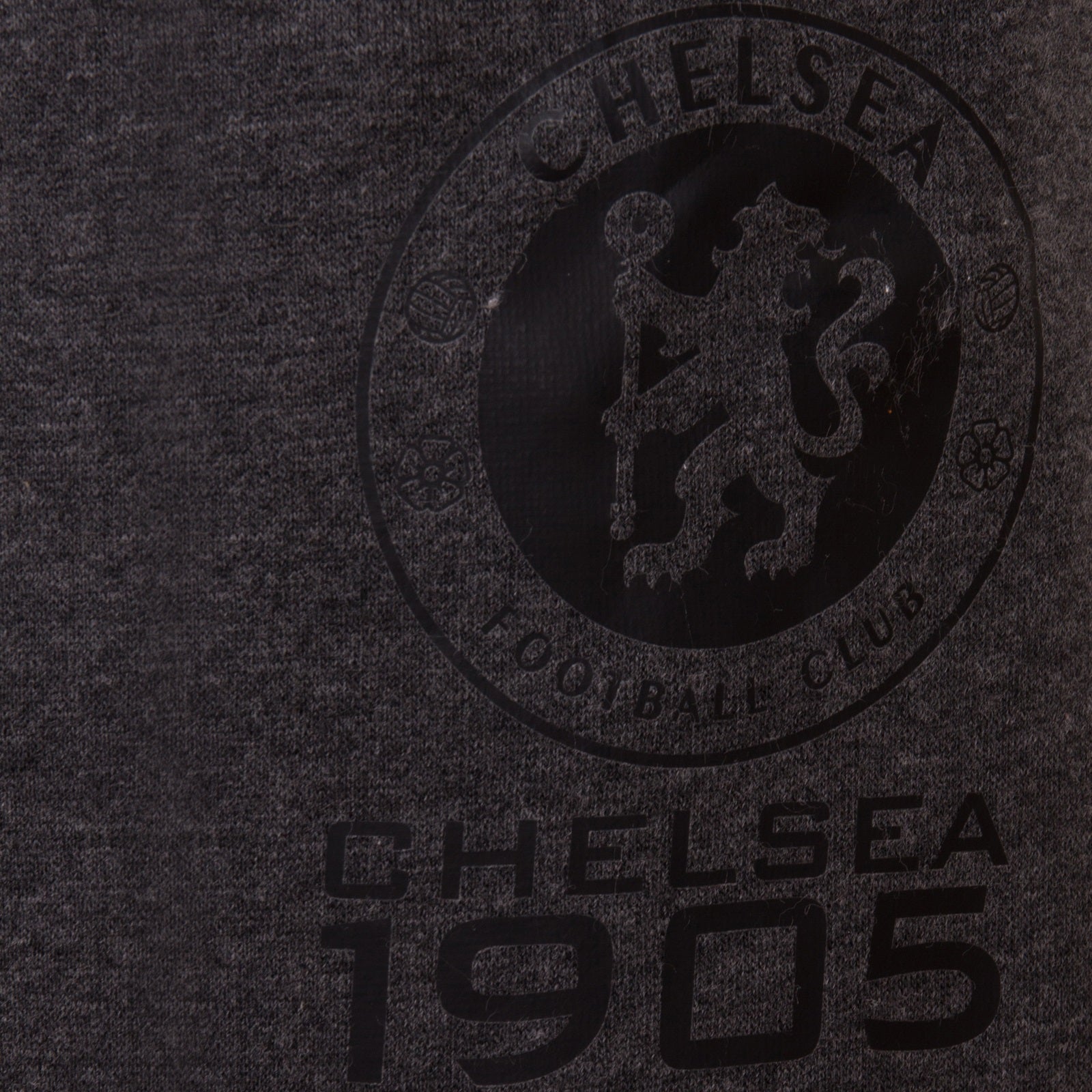 Chelsea kids slim fit track pants in grey with Chelsea 1905 text and club crest on left leg.