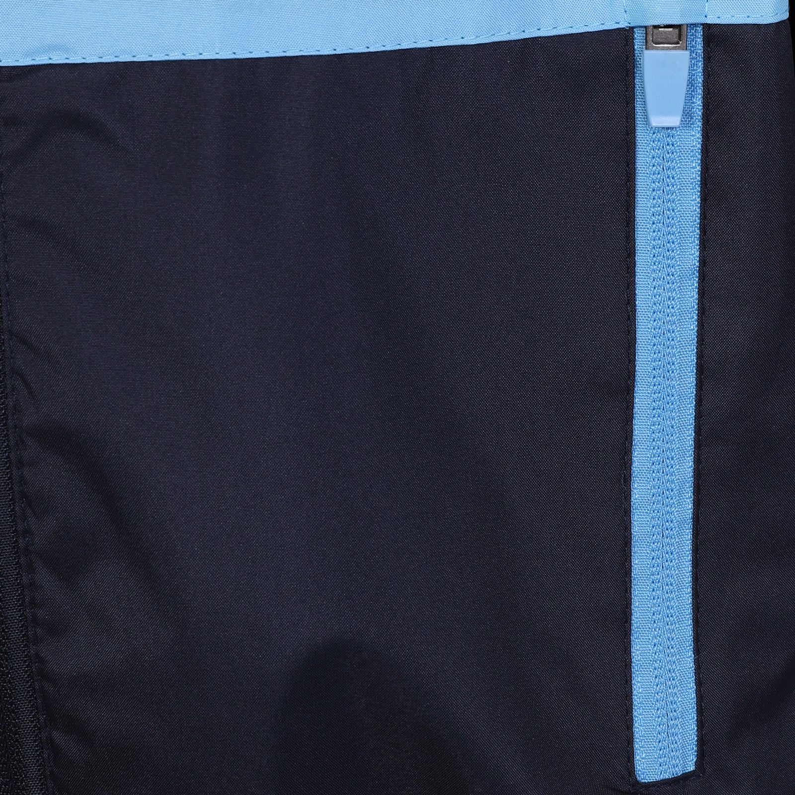Man City kids shower jacket in blue with club crest to chest.