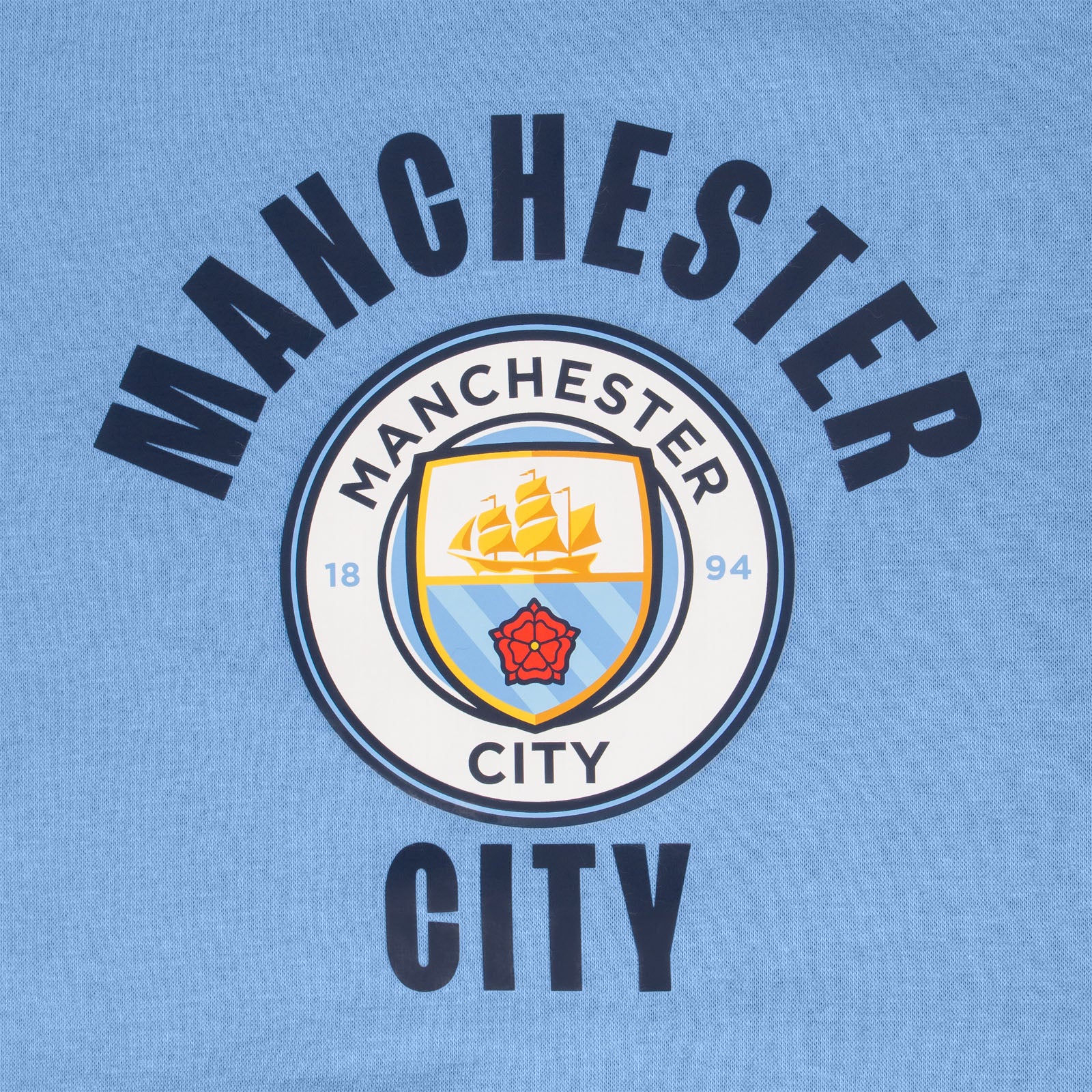 Man City kids graphic hoodie in sky with MCFC club crest to the centre of the body.