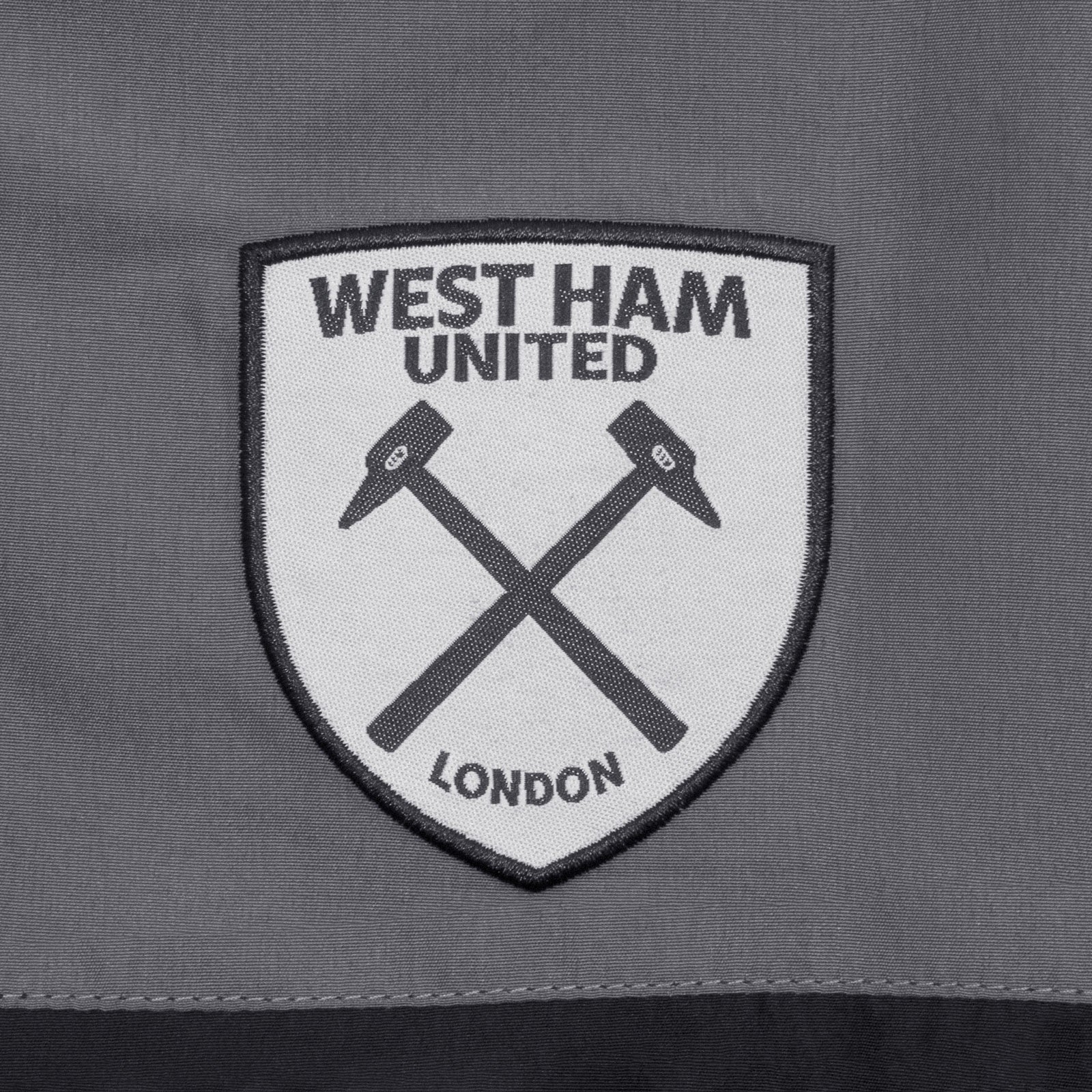 West Ham adults tracksuit in grey with club crest to chest and left thigh