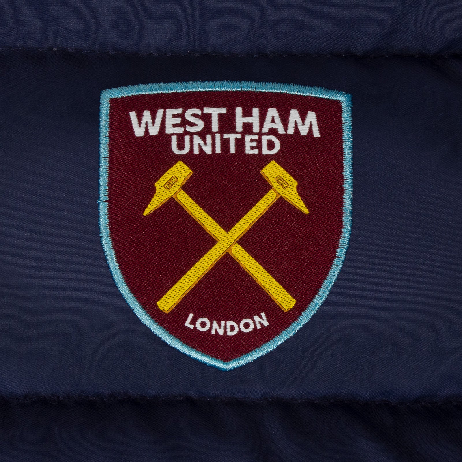 West Ham kids gilet in navy blue with club crest to chest.