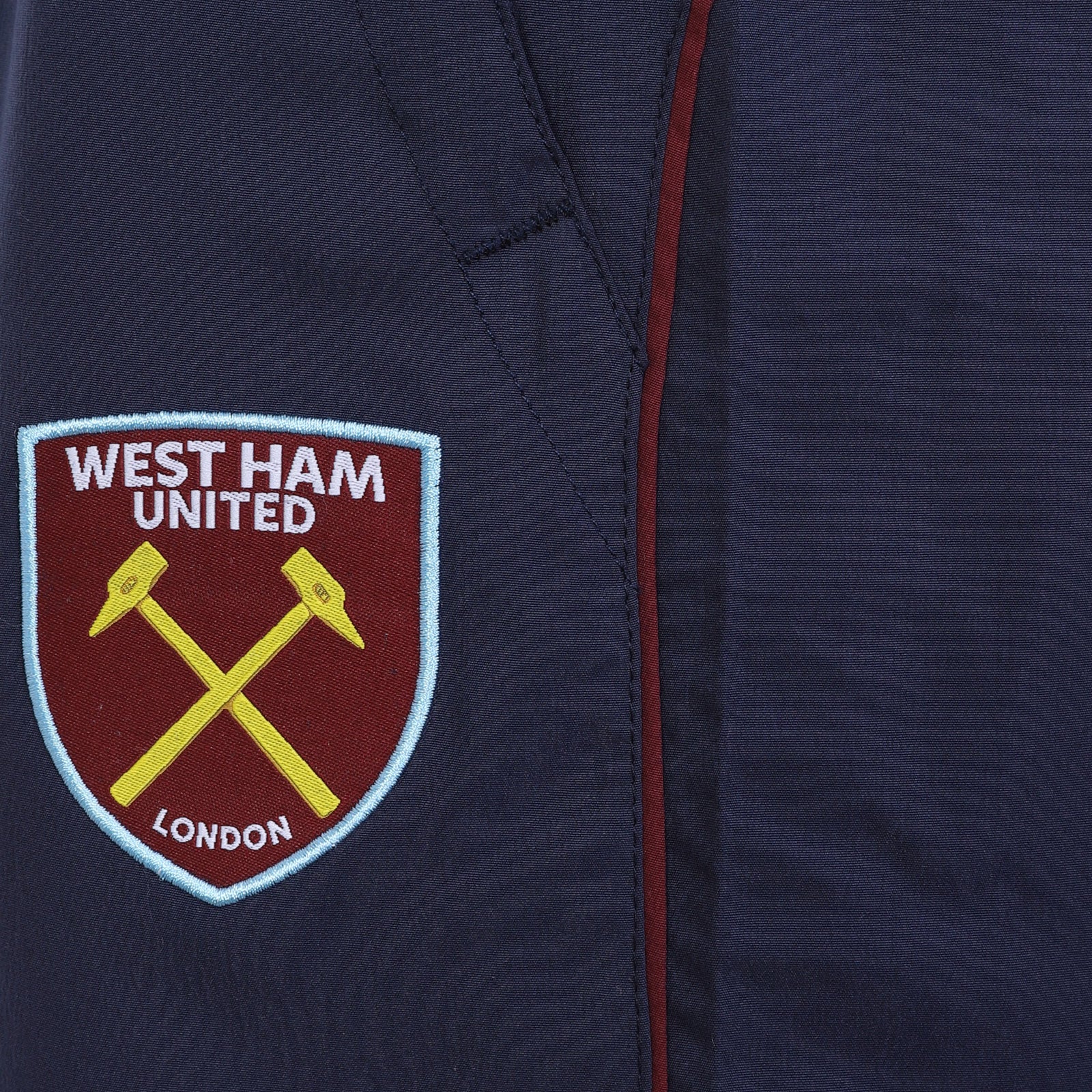 West Ham adults tracksuit in navy blue with club crest to chest and left thigh