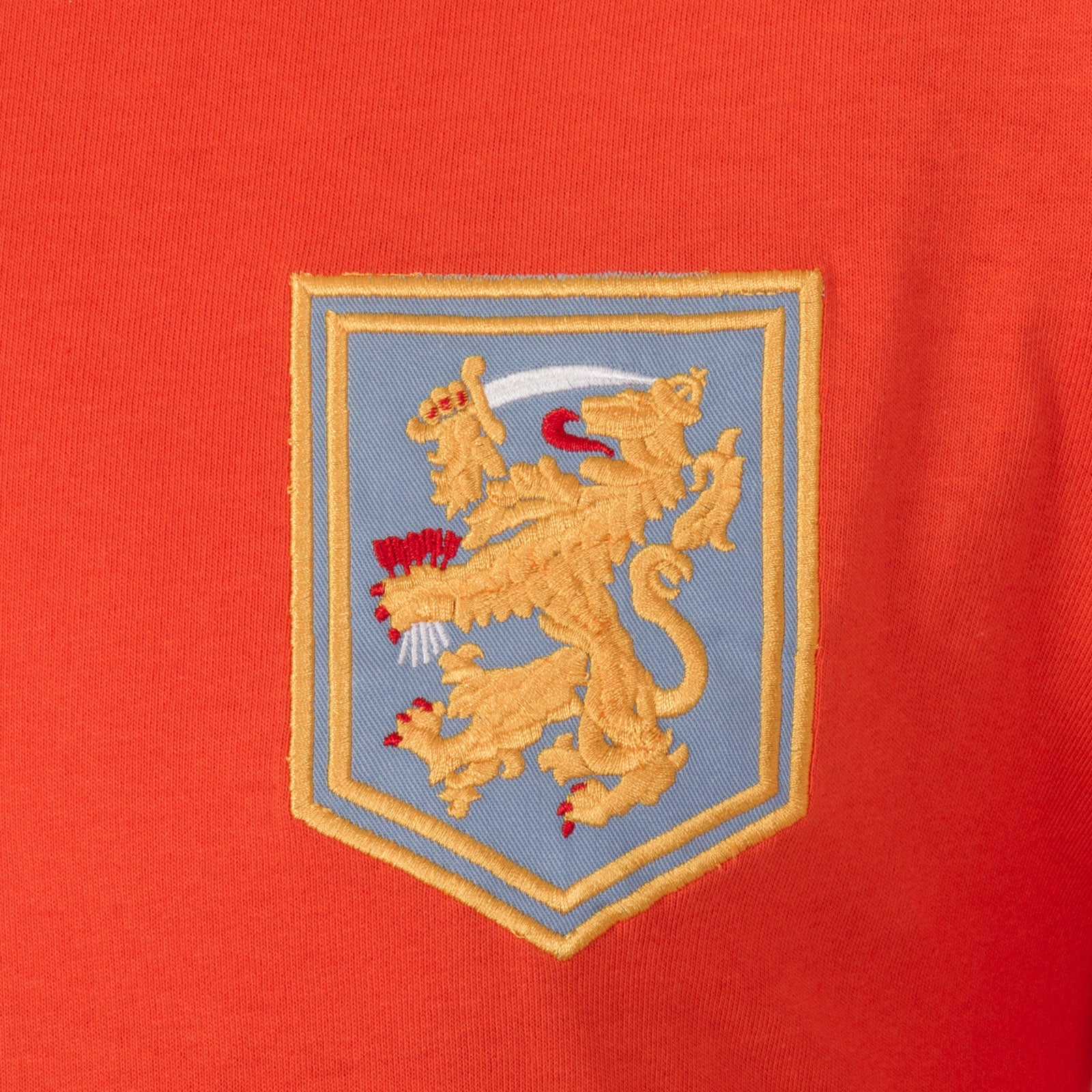 Holland retro football shirt. Replica shirt in orange with KNVB crest to chest.