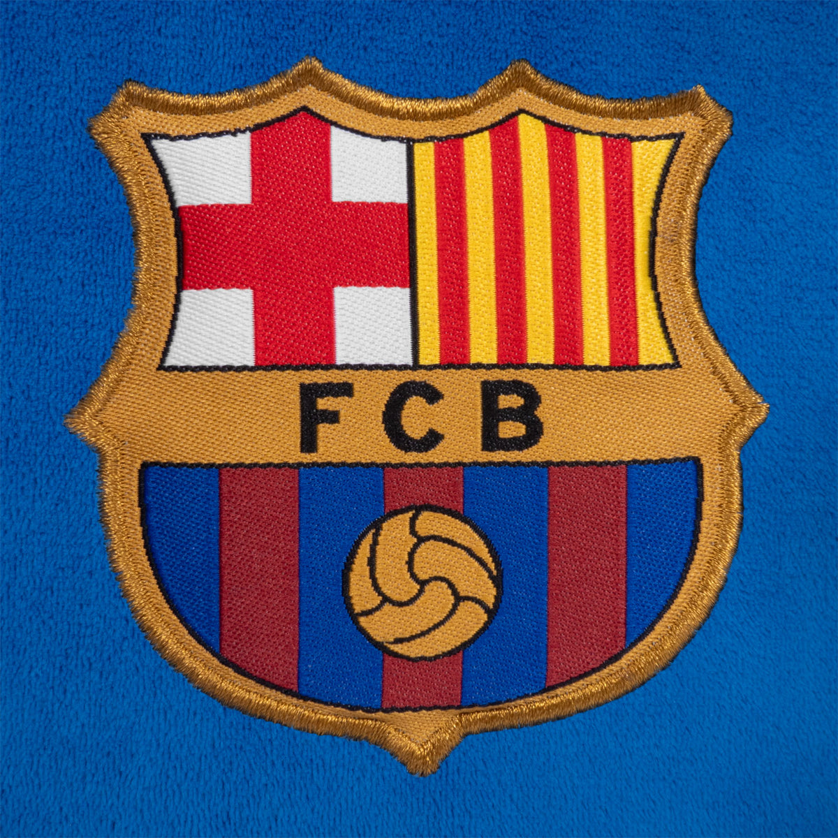 FC Barcelona kids hooded dressing gown in navy blue with FCB crest.