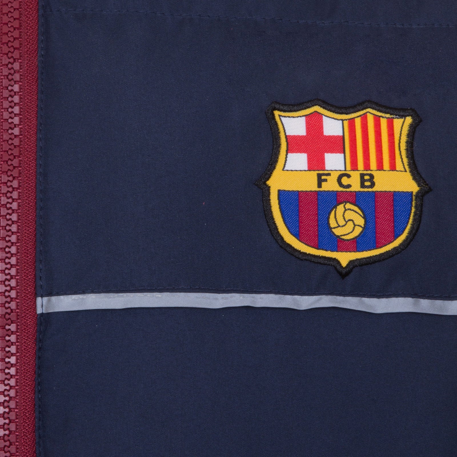 FC Barcelona kids quilted jacket in navy with club crest to chest.