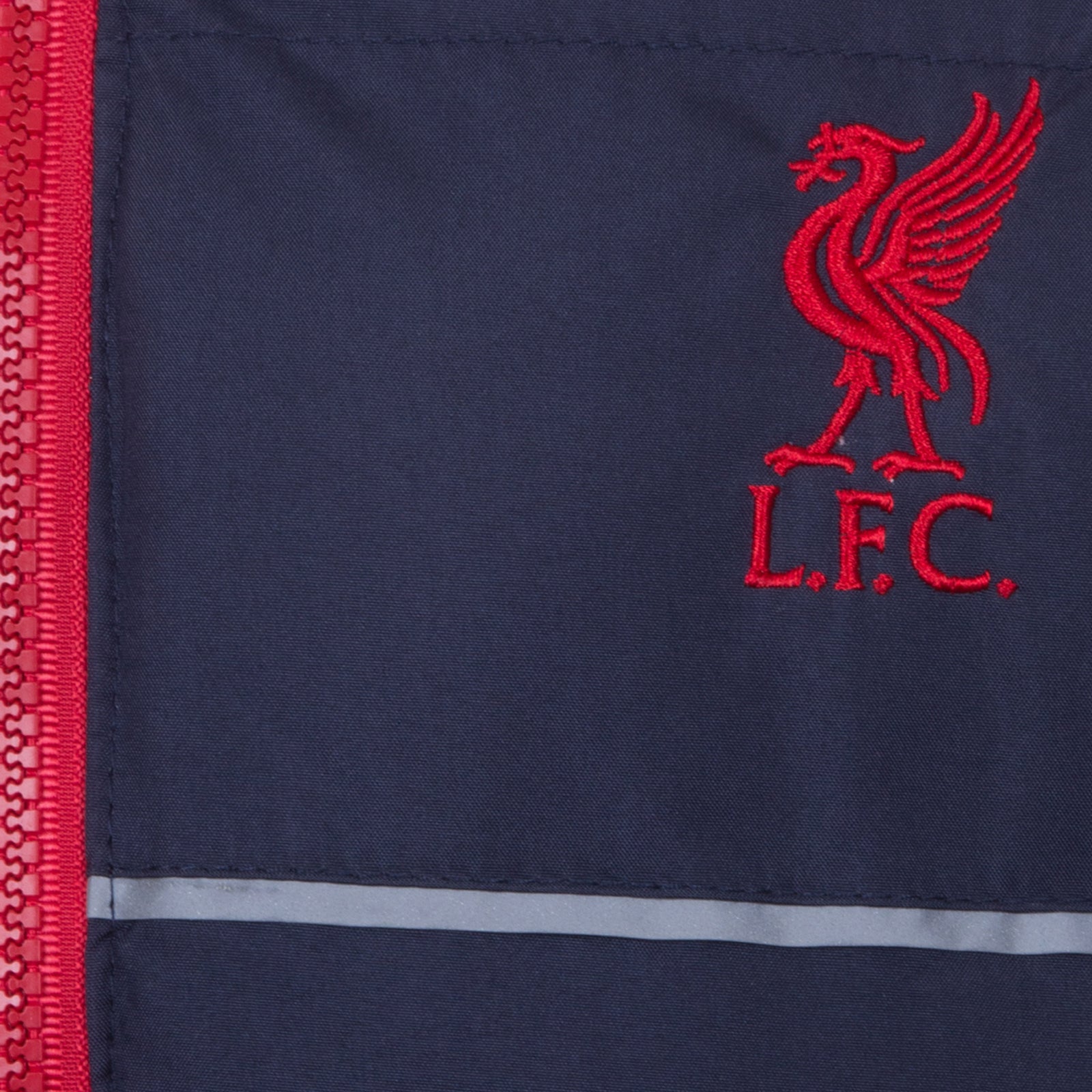 Liverpool kids quilted jacket in navy blue with club crest to chest.