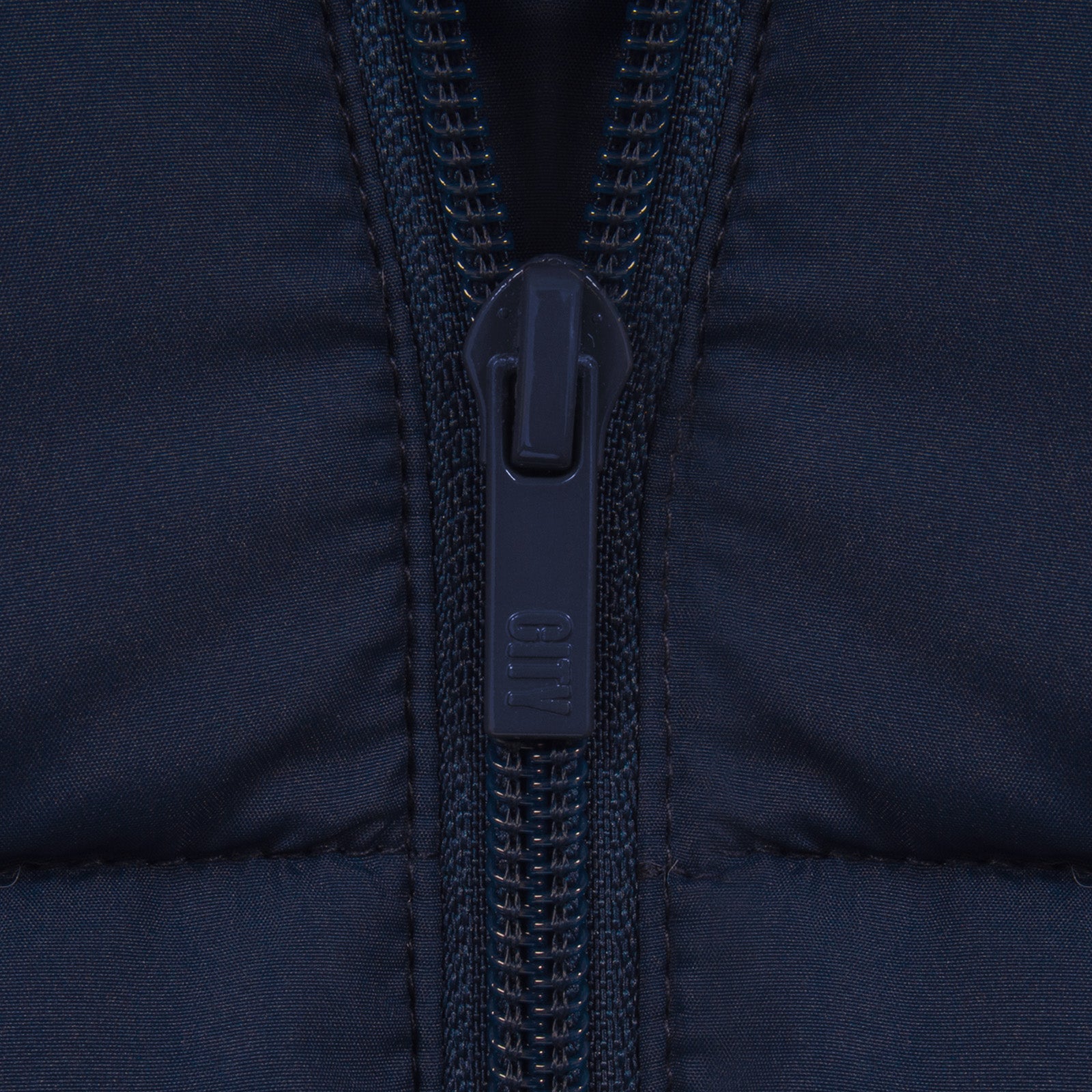 Man City kids quilted jacket in navy with club crest to chest.