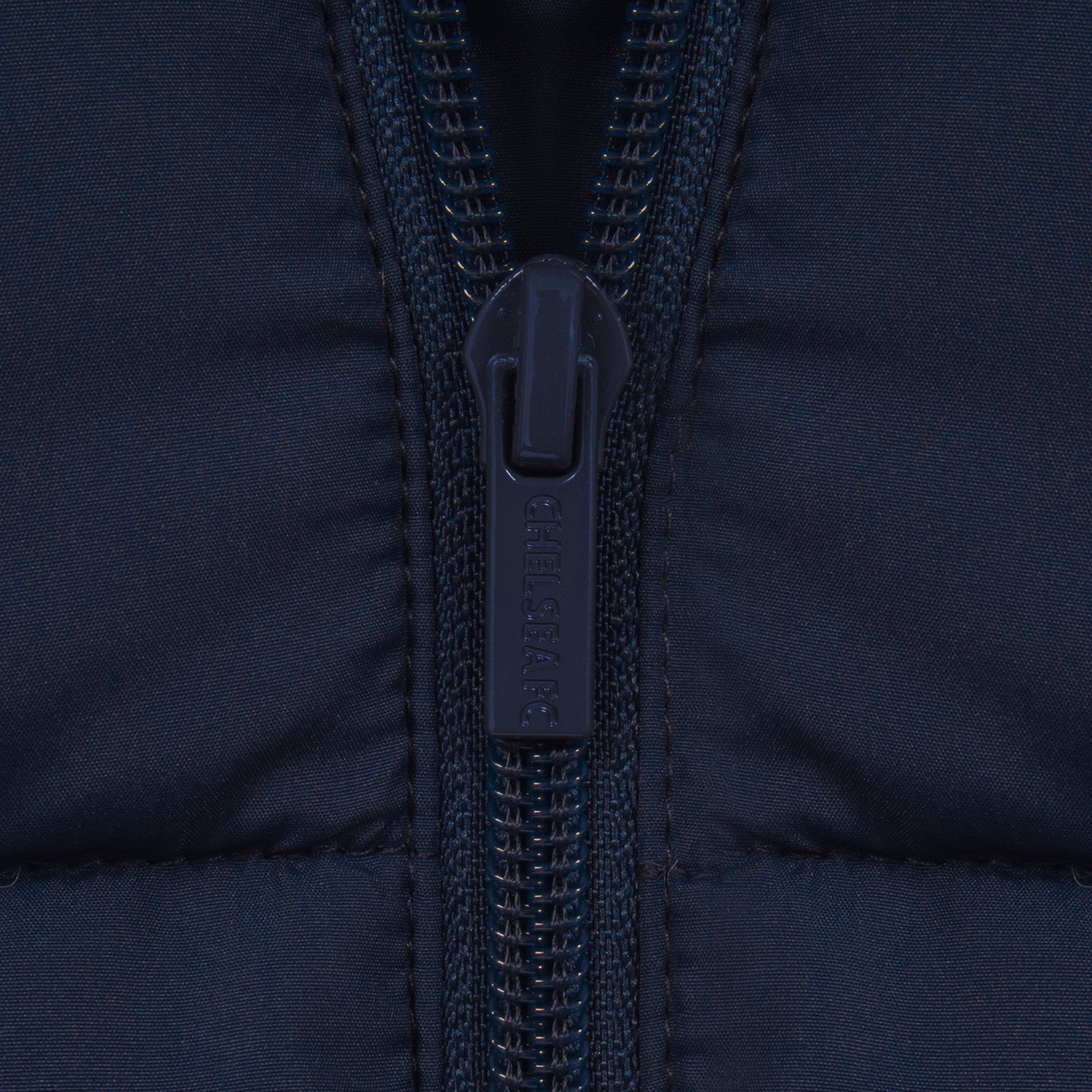 Chelsea kids quilted jacket in navy with club crest to chest.