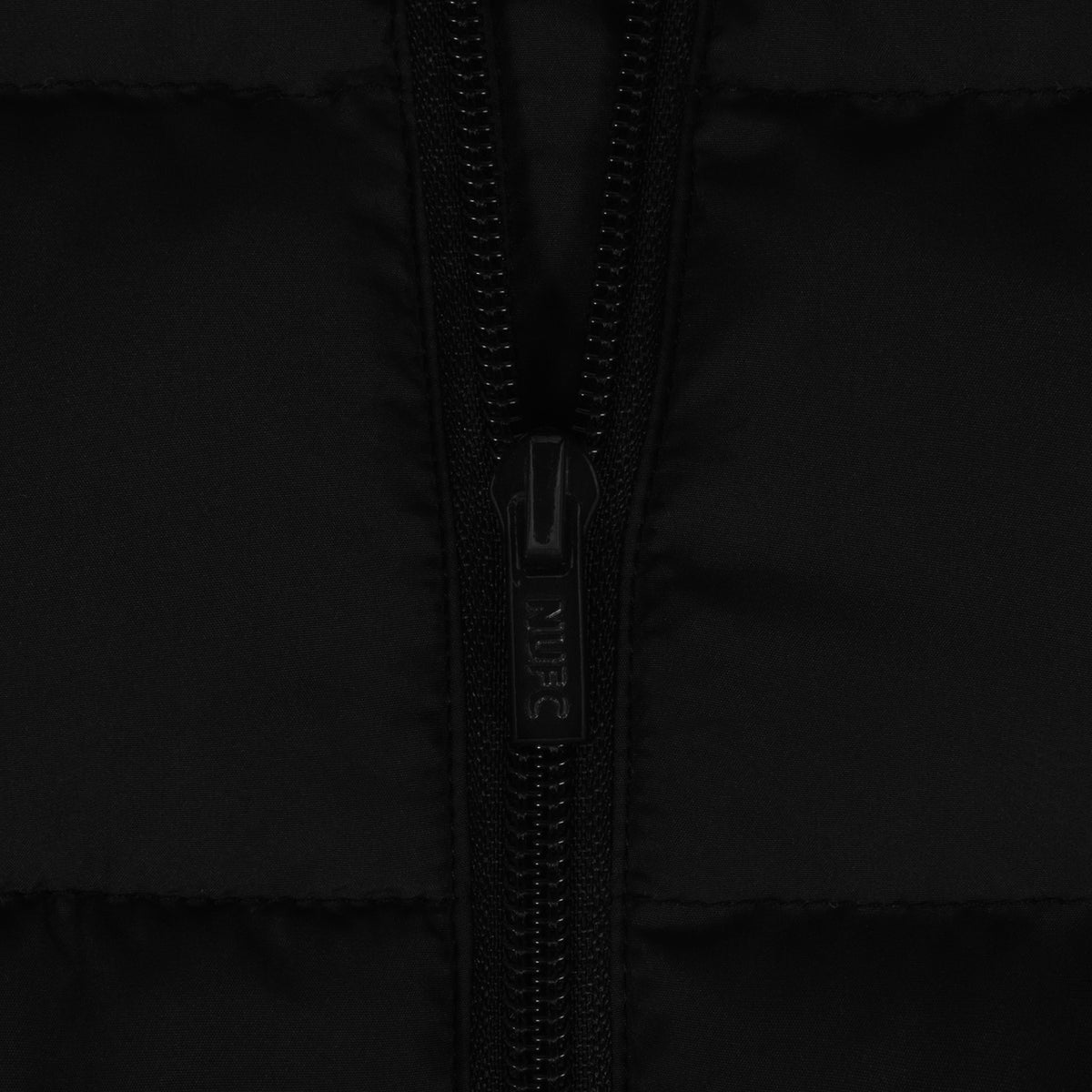 Newcastle United adults quilted jacket winter coat in black with club crest to chest.
