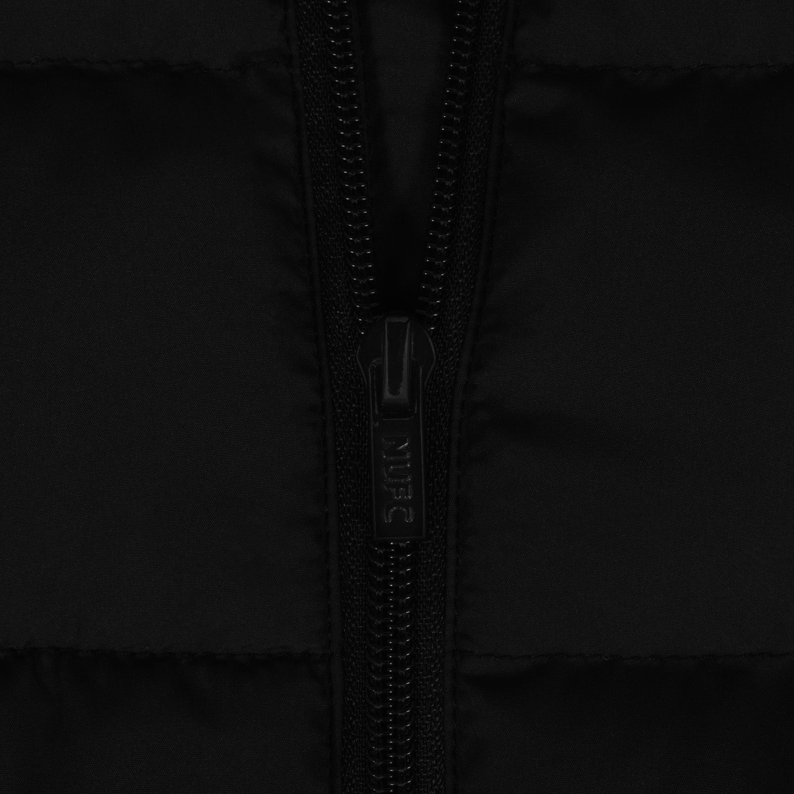 Newcastle United adults quilted jacket winter coat in black with club crest to chest.