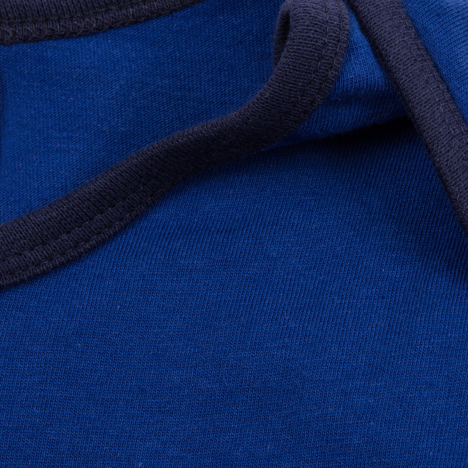 Chelsea baby pyjamas. Long sleeve pyjama top in blue with club crest & text print. Blue bottoms with all over club crest print