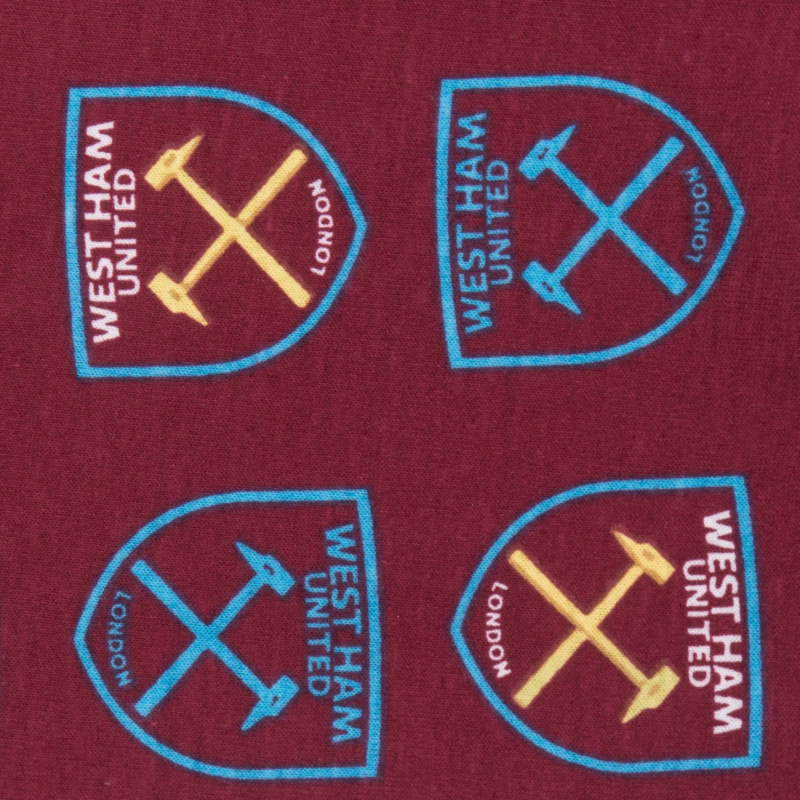 West Ham baby pyjamas with claret & blue top and claret bottoms.