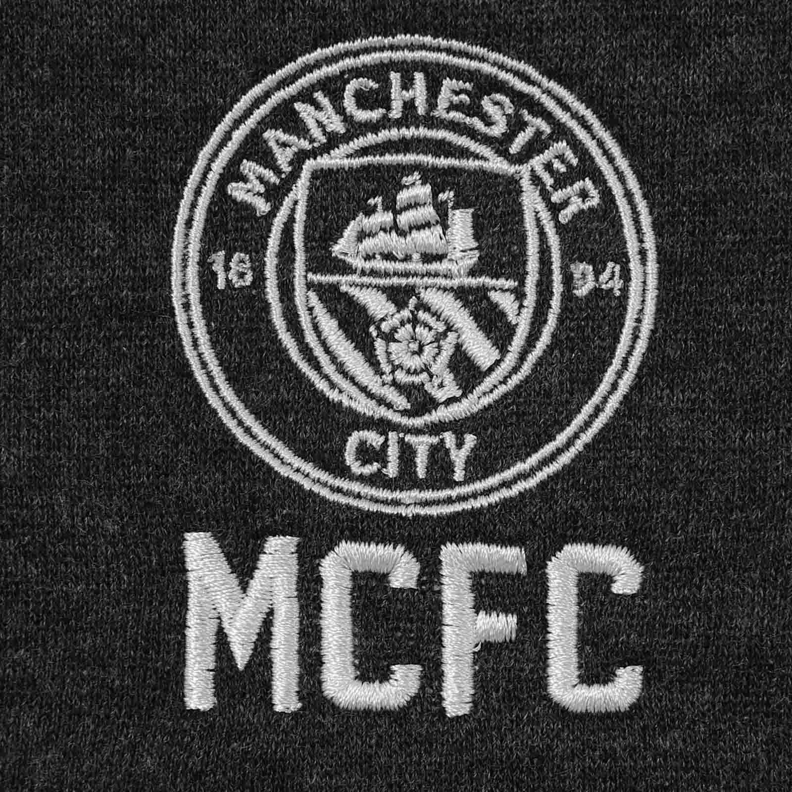 Man City kids retro varsity jacket, fleece in charcoal grey with club crest to chest.