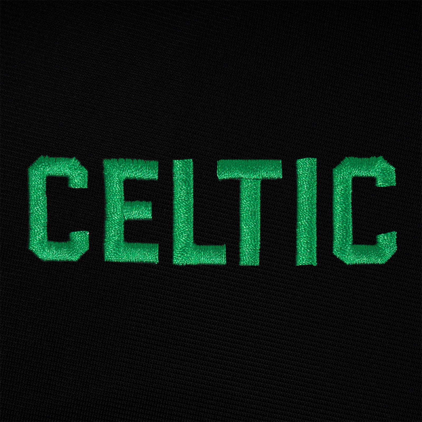 Celtic adults track jacket in black & green with retro crest on the chest.