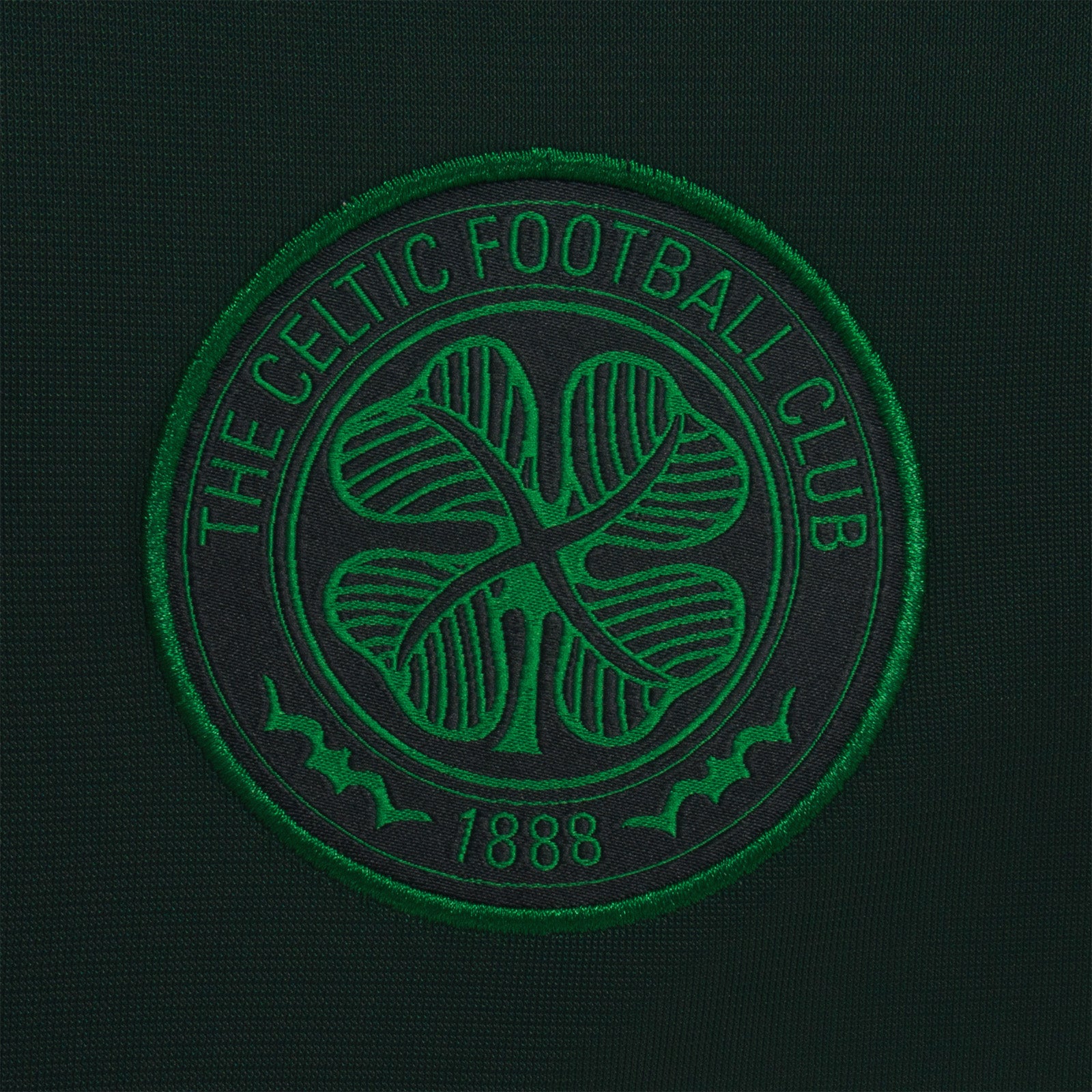 Celtic adults track jacket in forest green with club crest on the chest.