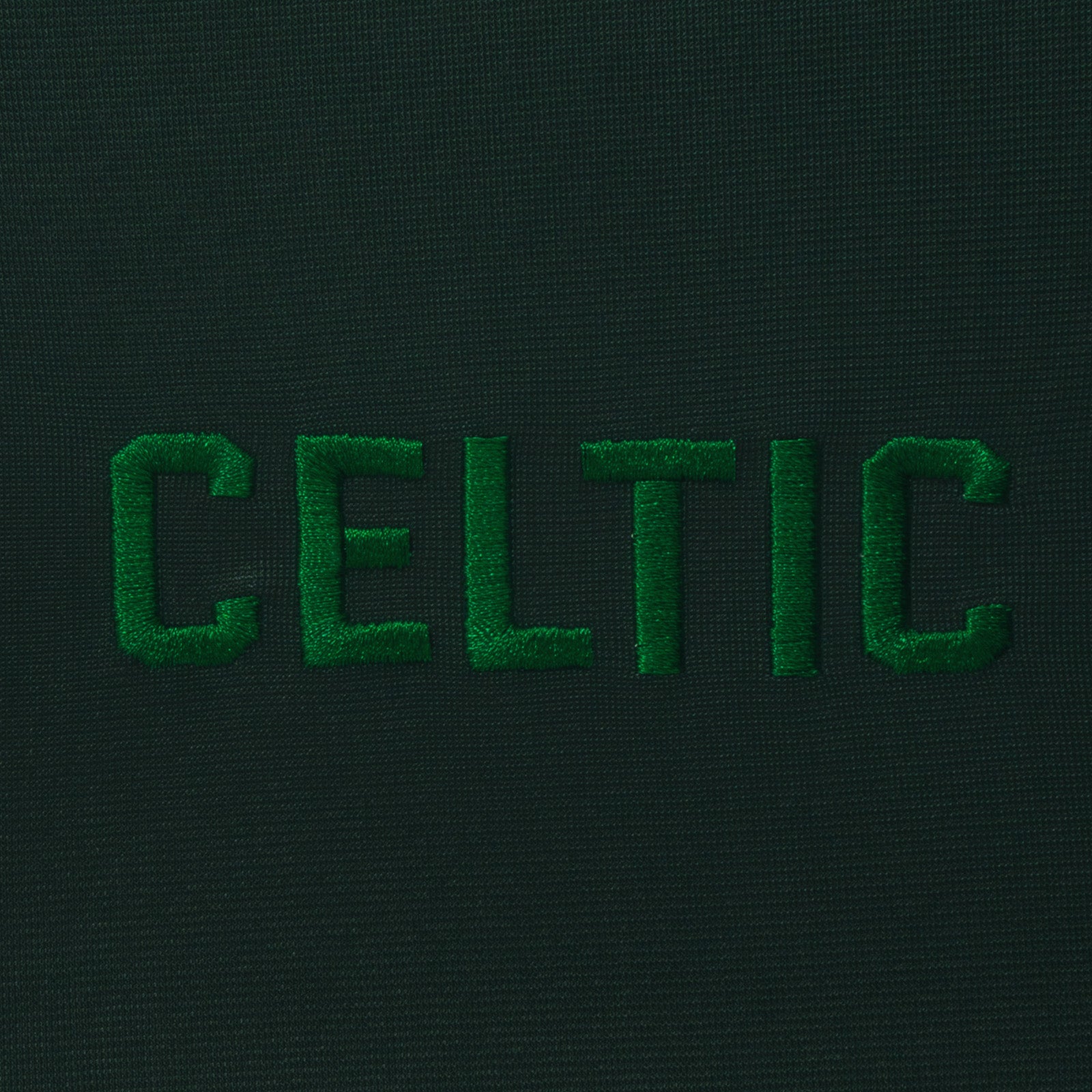 Celtic adults track jacket in forest green with club crest on the chest.