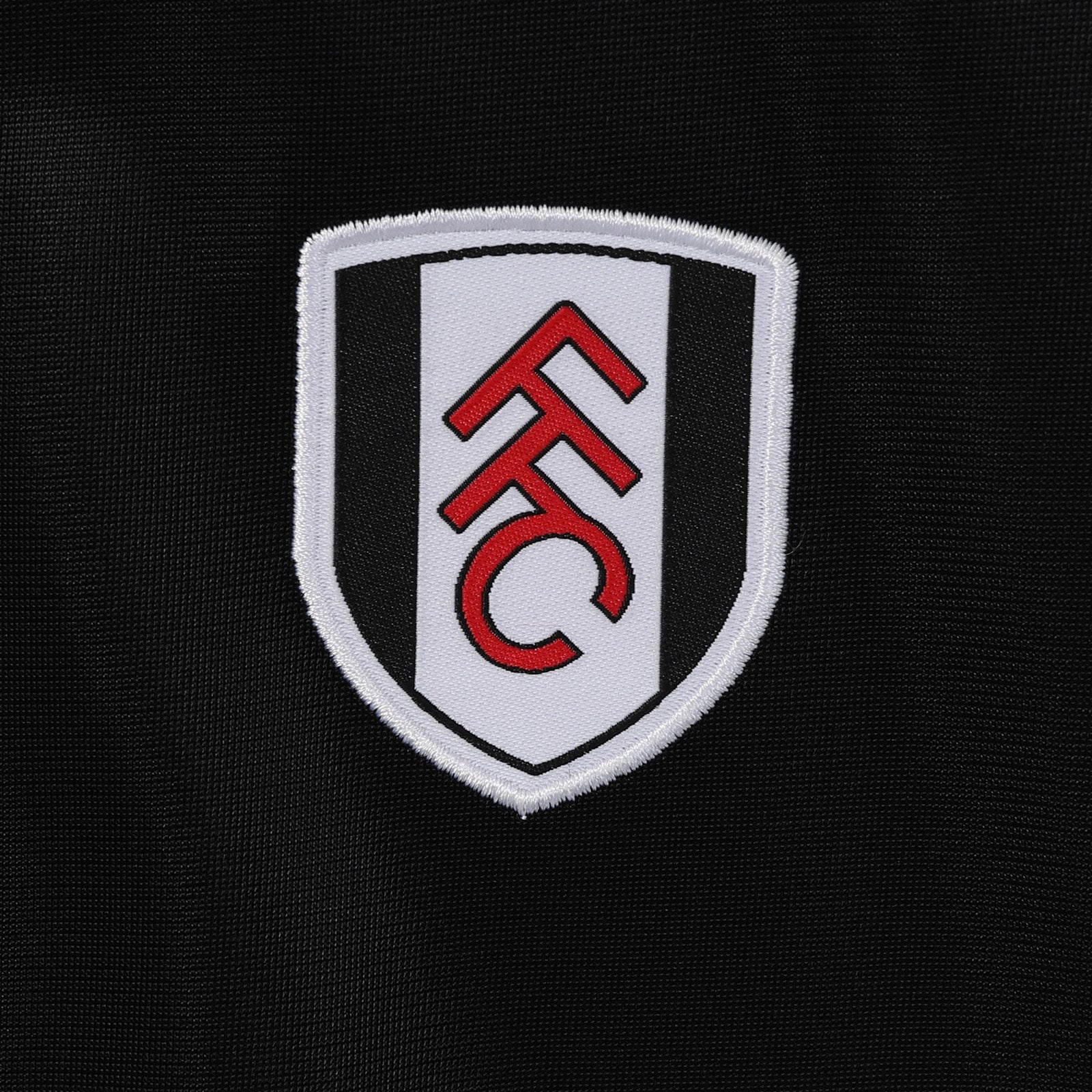 Fulham adults retro track jacket in black with club crest to chest.