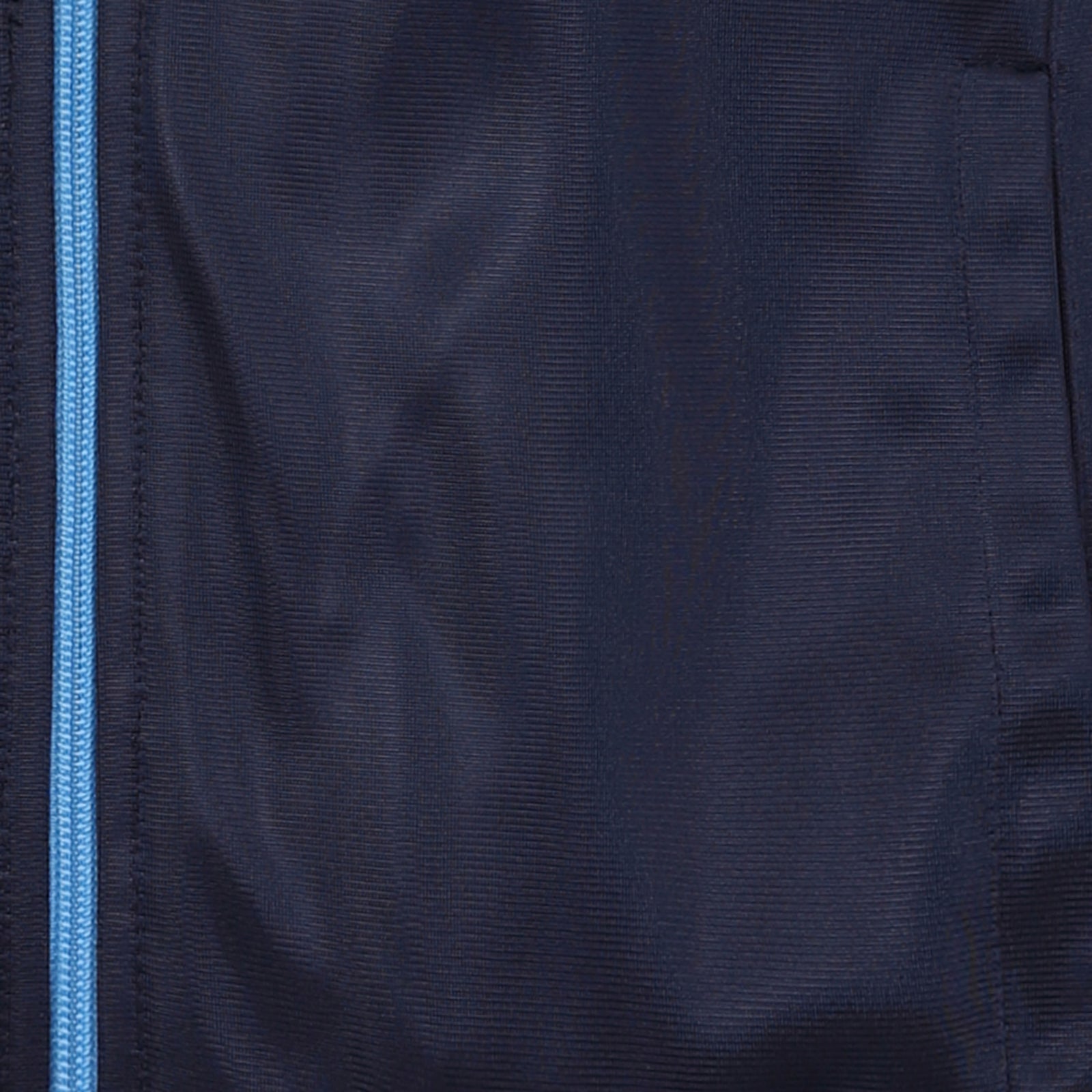 Man City adults retro track jacket in navy blue with club crest to chest.